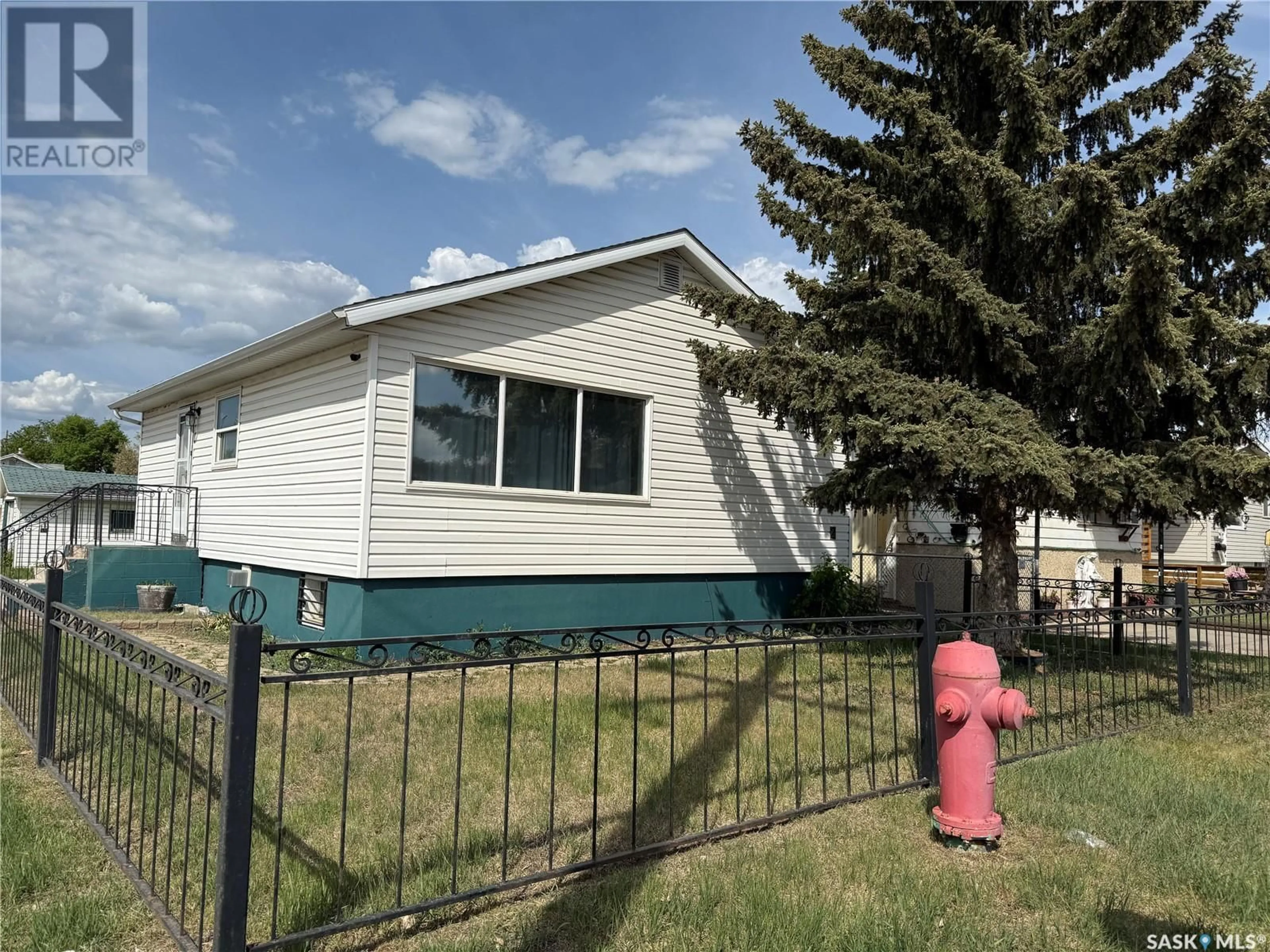 Home with vinyl exterior material, street for 2 31ST STREET, Prince Albert Saskatchewan S6V1Z8