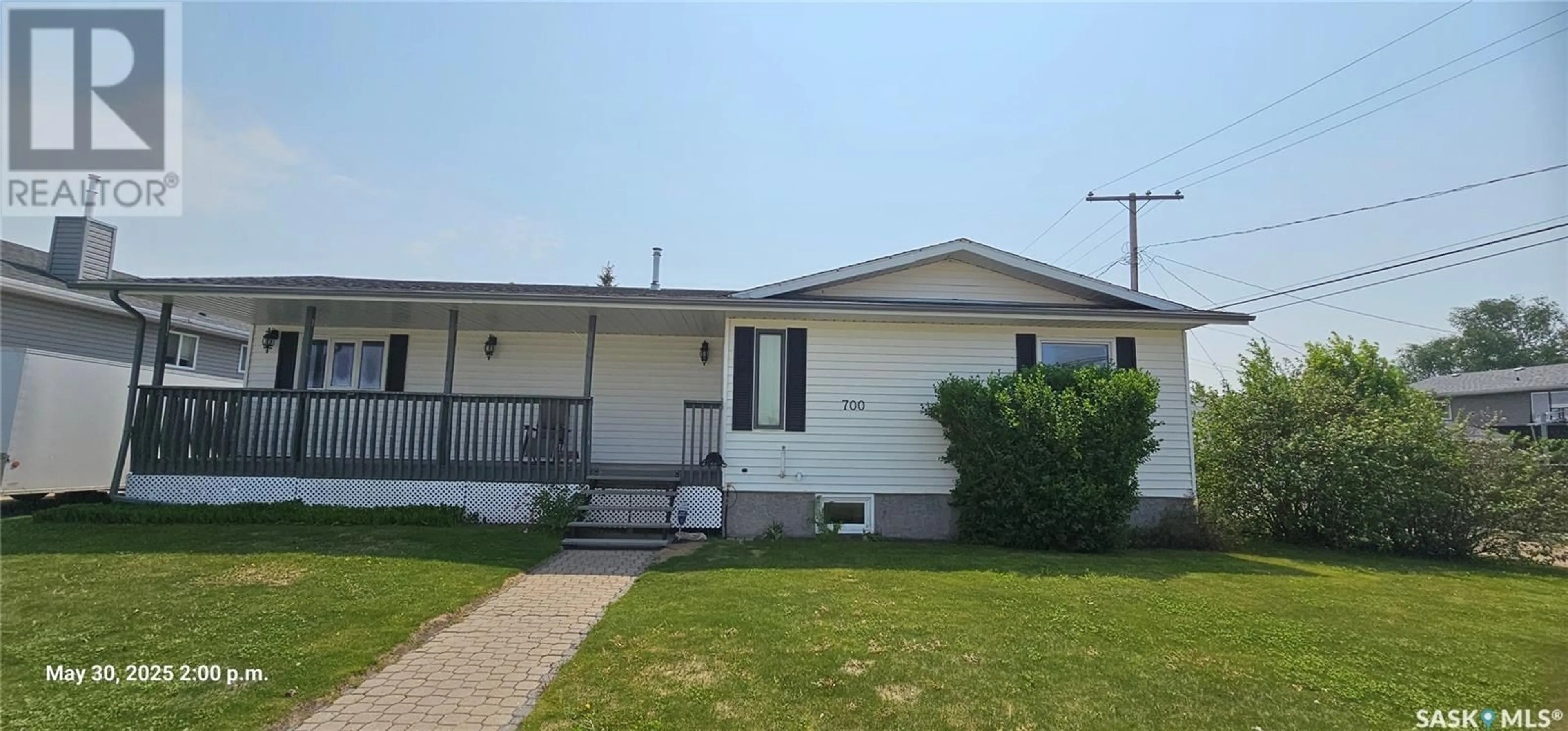 Home with vinyl exterior material, street for 700 6TH STREET, Martensville Saskatchewan S0K2T2