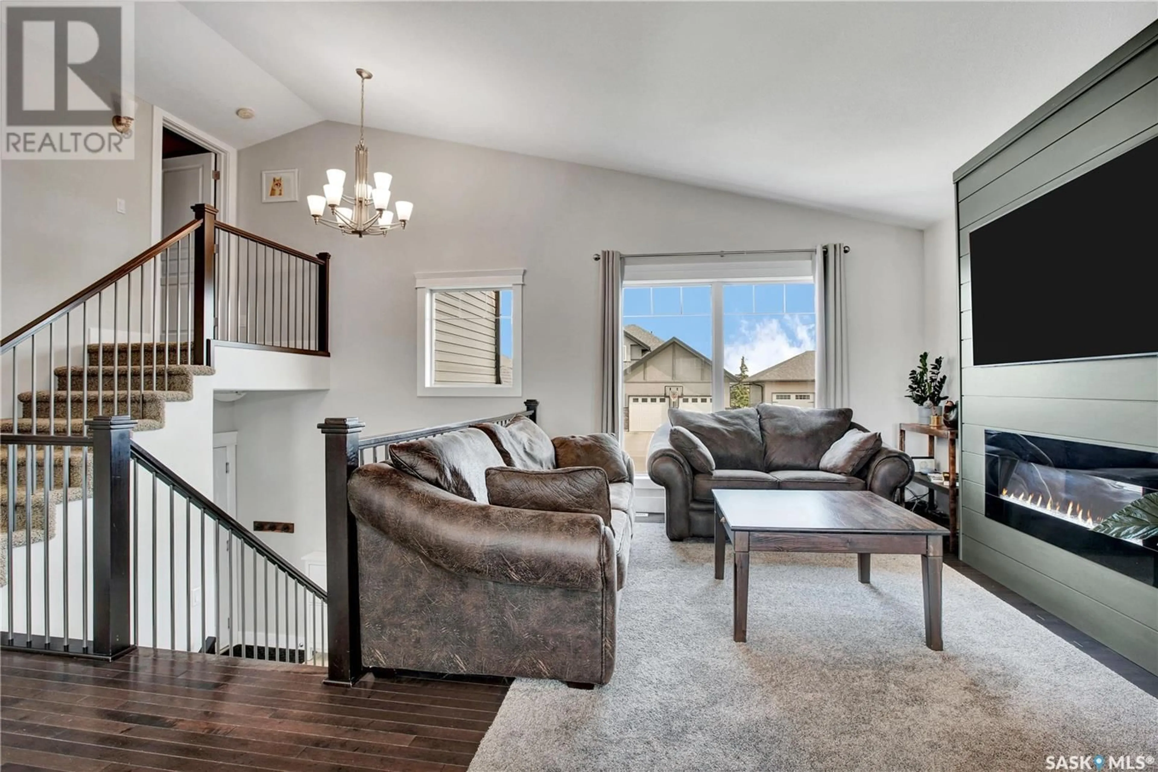 Living room with furniture, unknown for 527 REDWOOD CRESCENT, Warman Saskatchewan S0K4S2