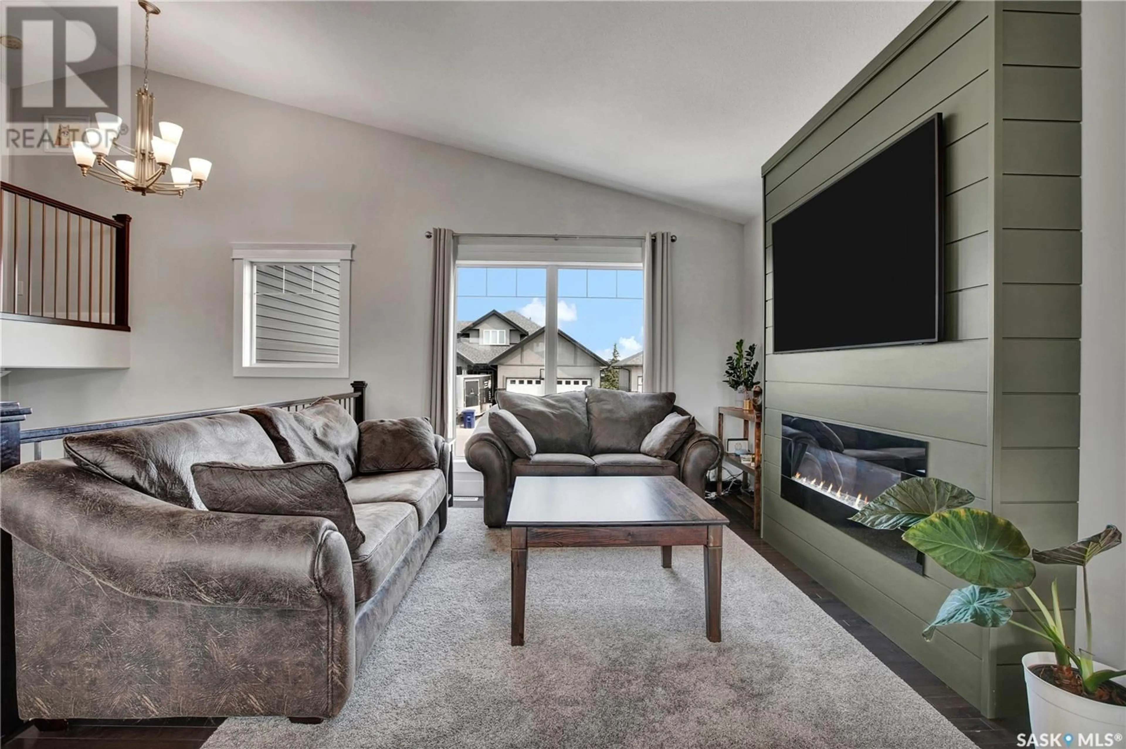 Living room with furniture, unknown for 527 REDWOOD CRESCENT, Warman Saskatchewan S0K4S2