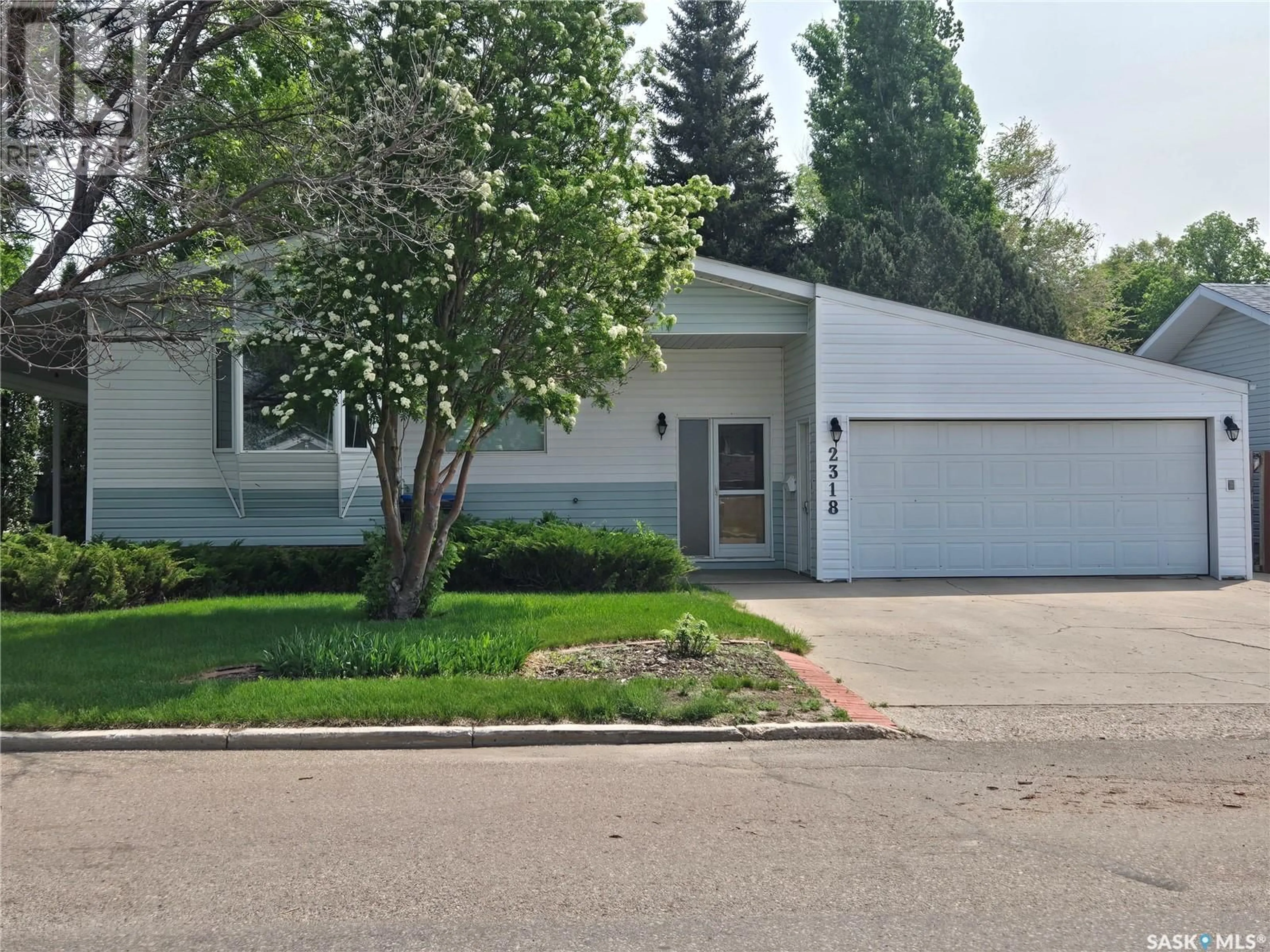 Home with vinyl exterior material, street for 2318 VICTORY ROAD, Estevan Saskatchewan S4A1Y4