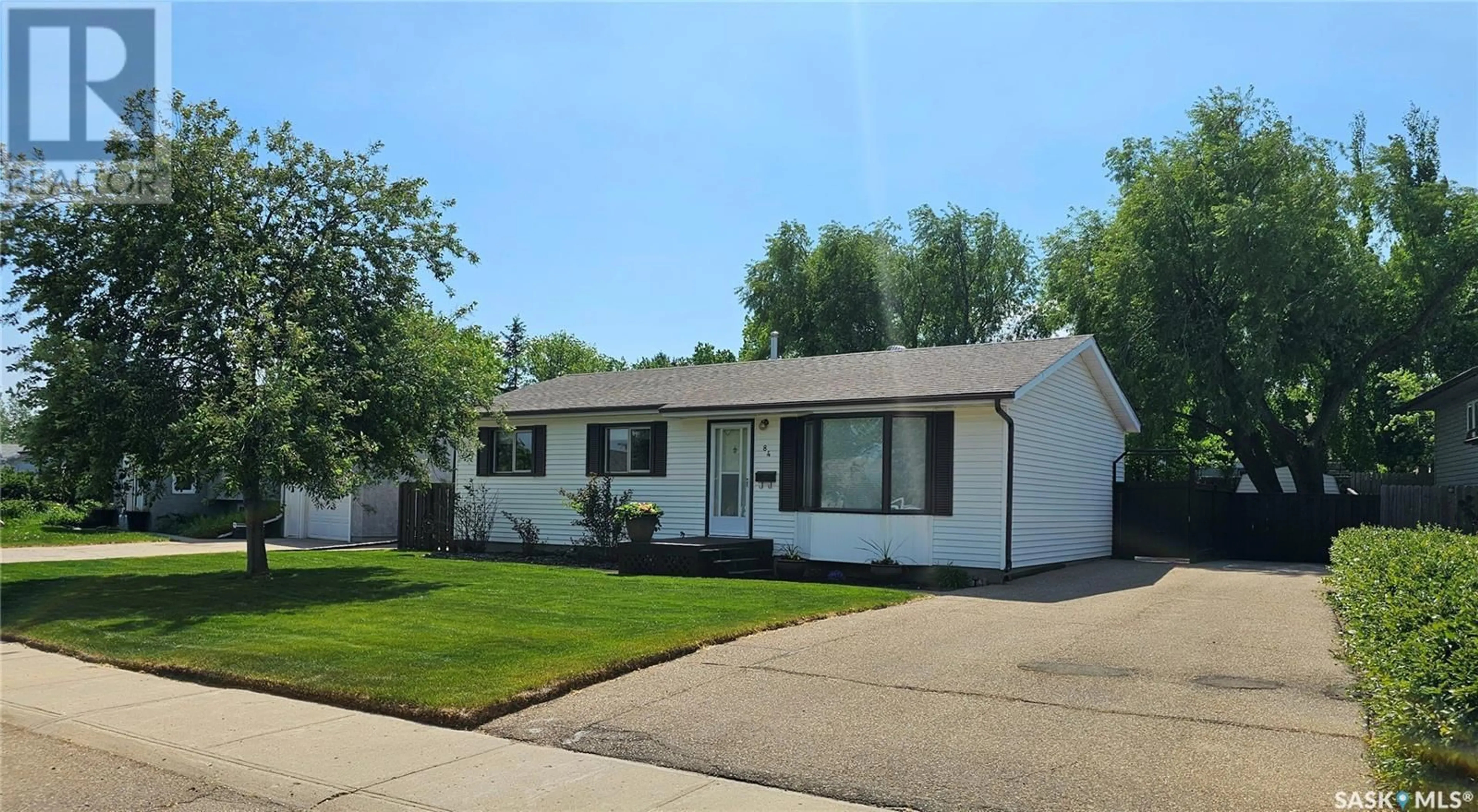 Home with vinyl exterior material, street for 84 WEAVER CRESCENT, Swift Current Saskatchewan S9H4B9