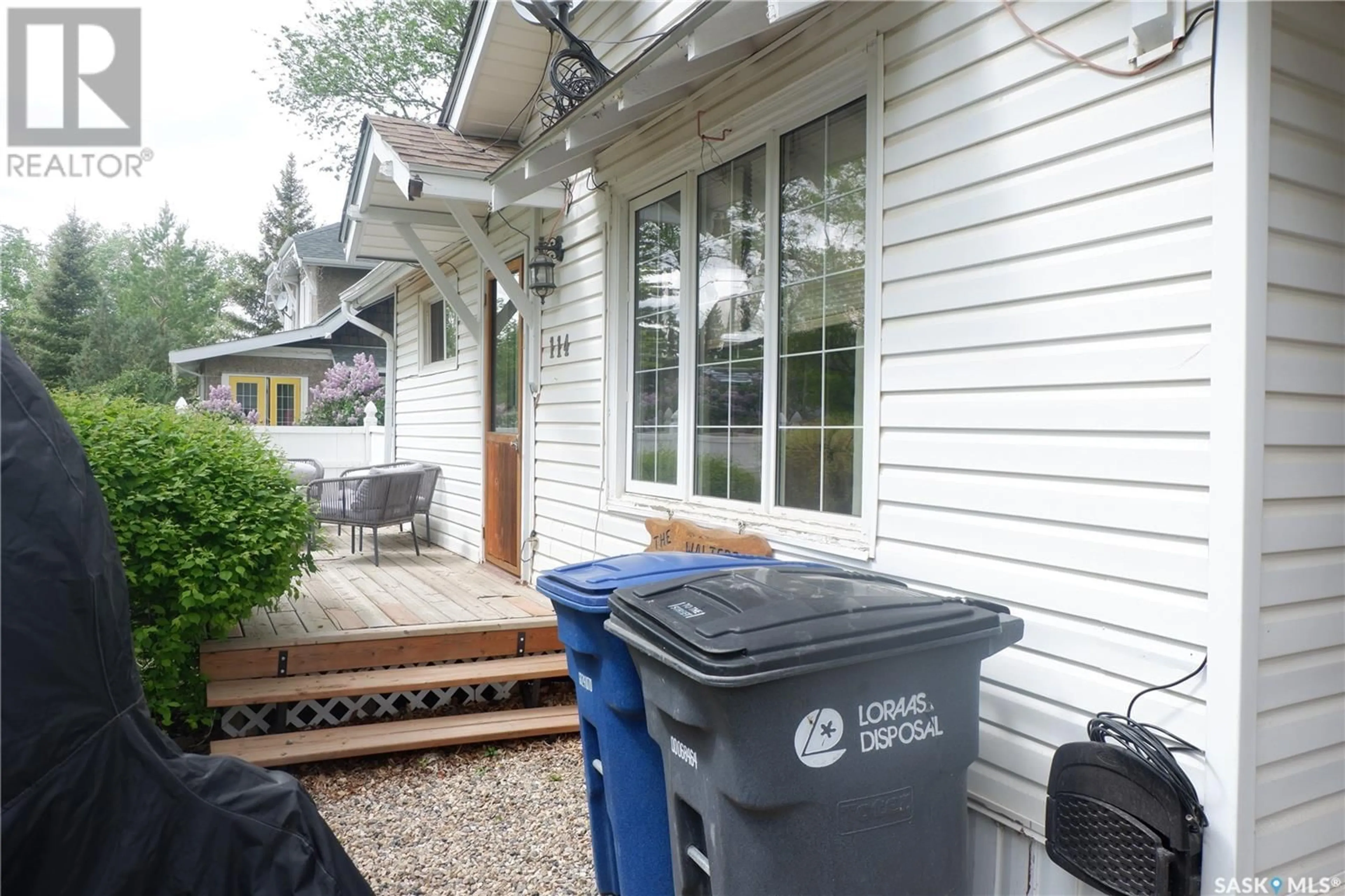 Home with vinyl exterior material, street for 114 5TH AVENUE, Assiniboia Saskatchewan S0H0B0