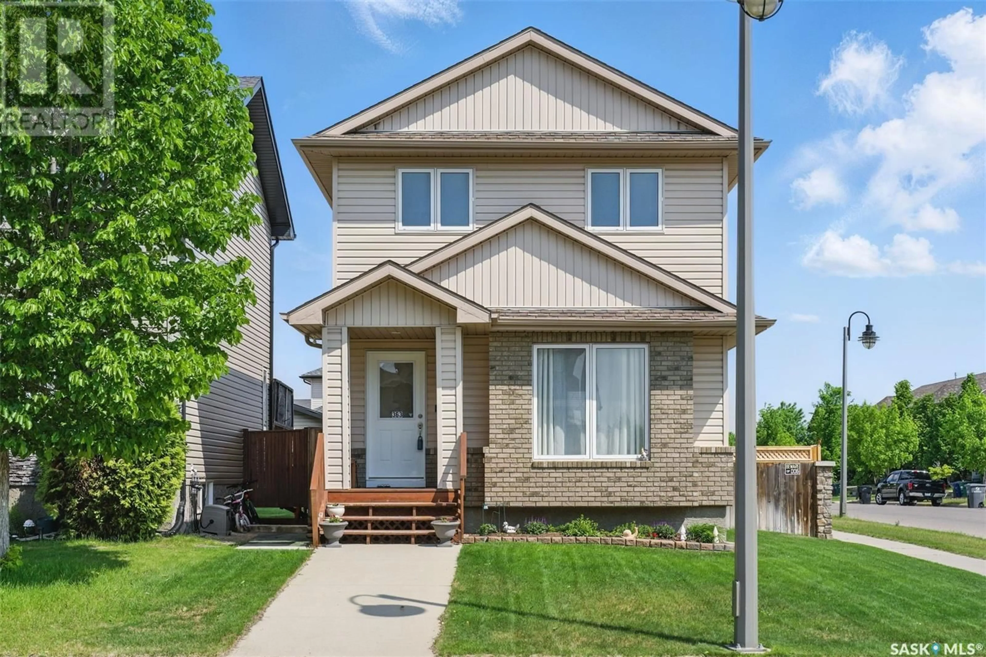 Home with brick exterior material, street for 363 LYND LANE, Saskatoon Saskatchewan S7T0B1