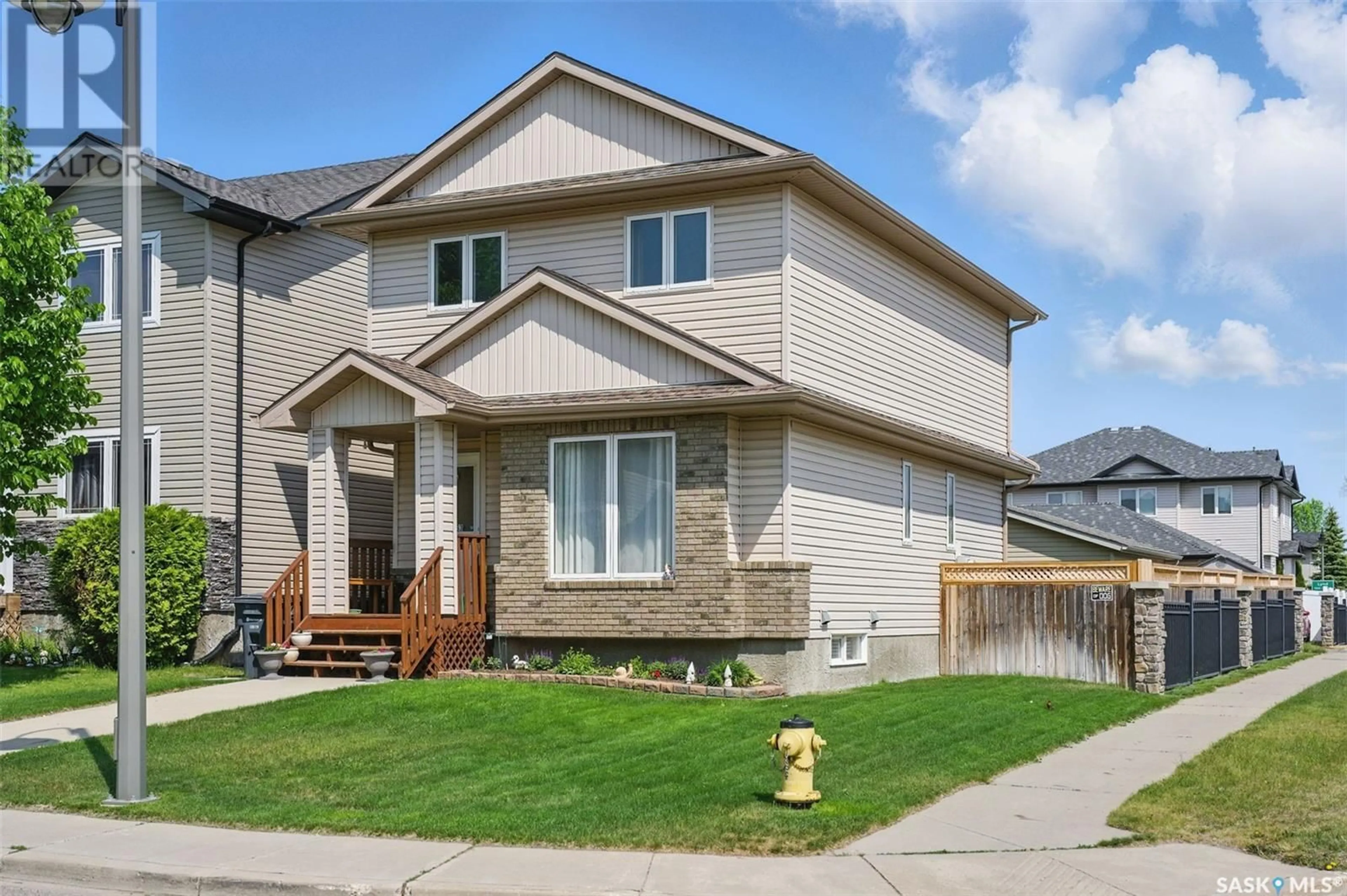 Home with vinyl exterior material, street for 363 LYND LANE, Saskatoon Saskatchewan S7T0B1