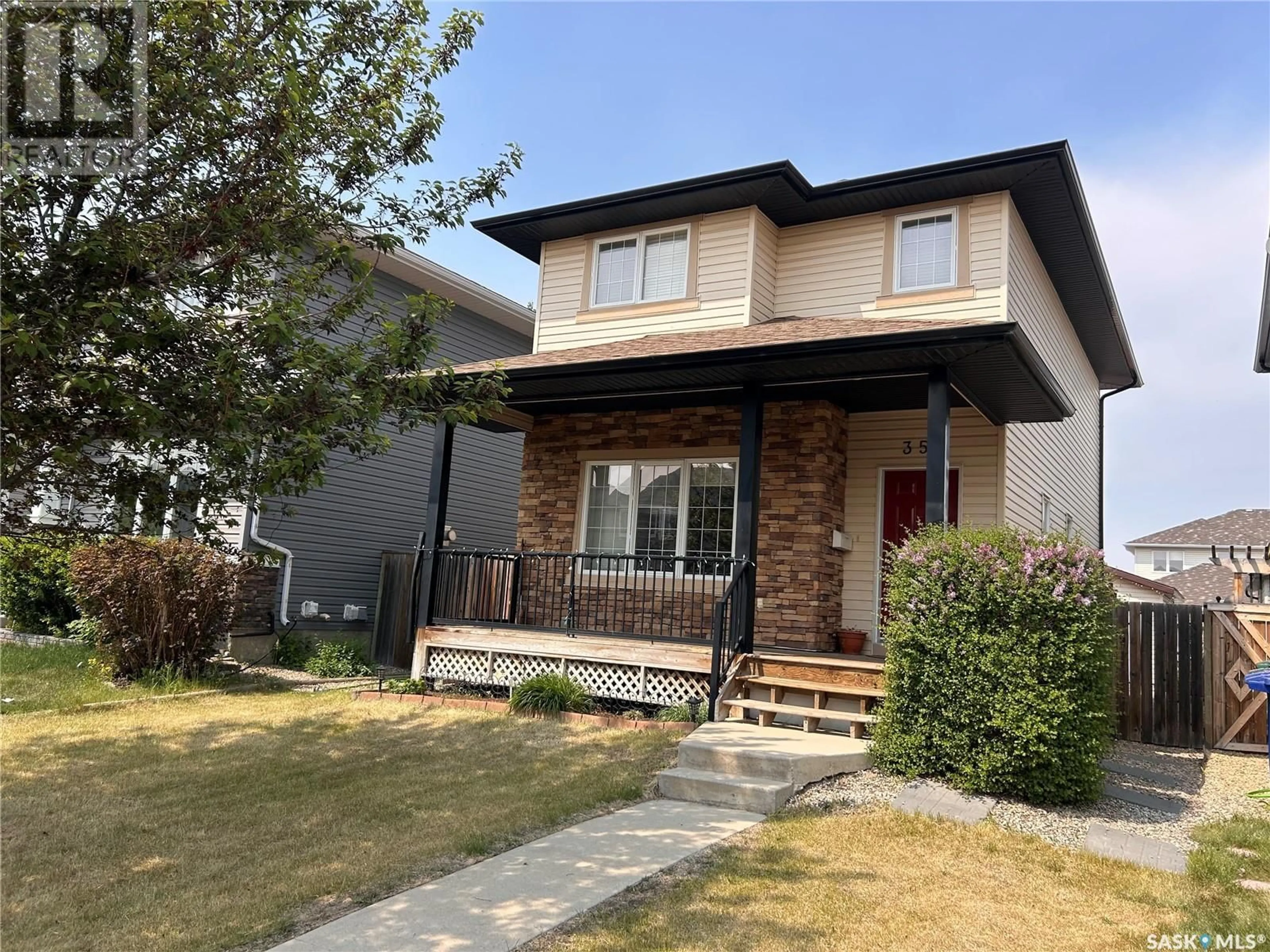 Home with brick exterior material, street for 351 LYND LANE, Saskatoon Saskatchewan S7T0B1