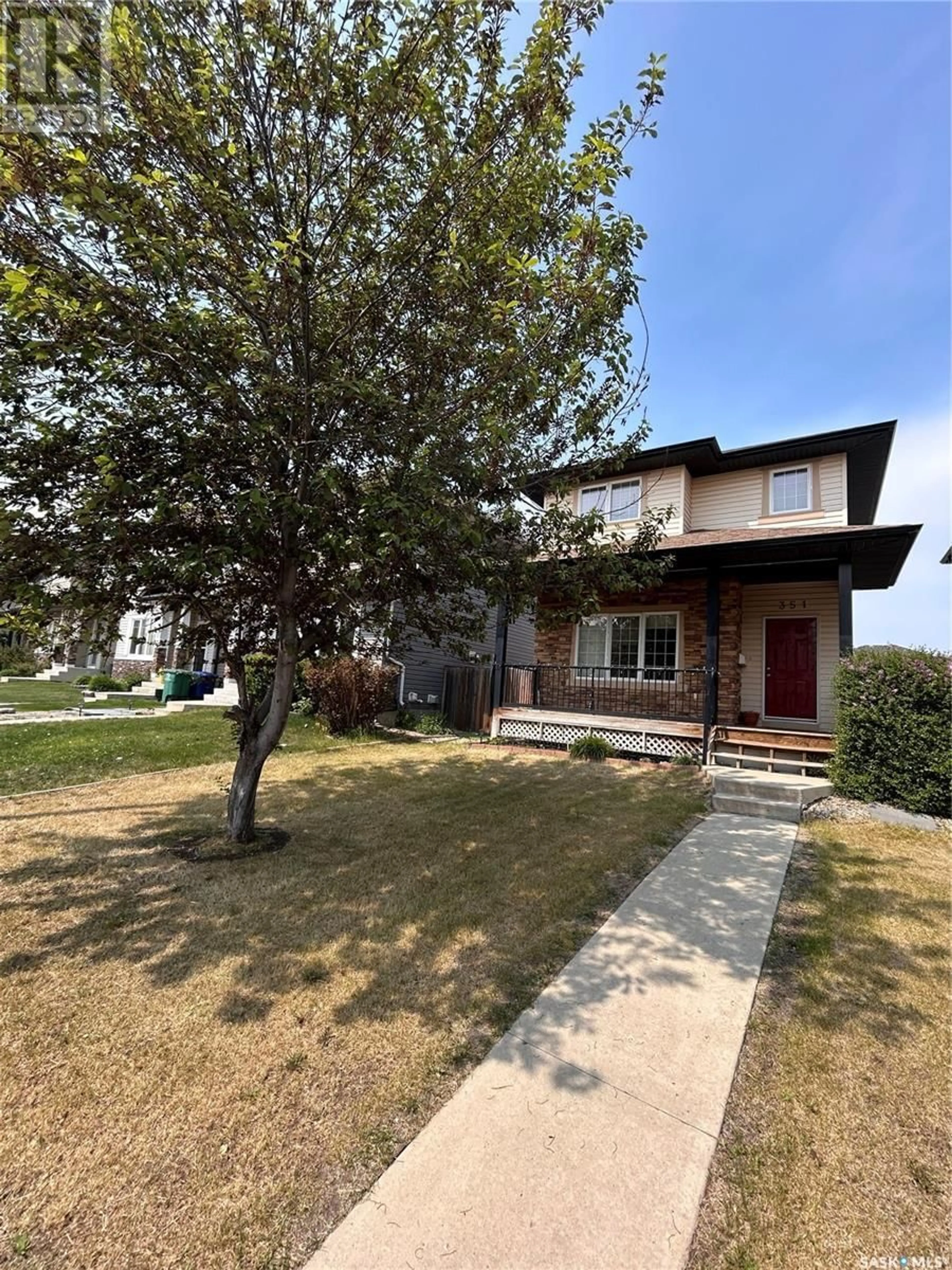 A pic from outside/outdoor area/front of a property/back of a property/a pic from drone, street for 351 LYND LANE, Saskatoon Saskatchewan S7T0B1