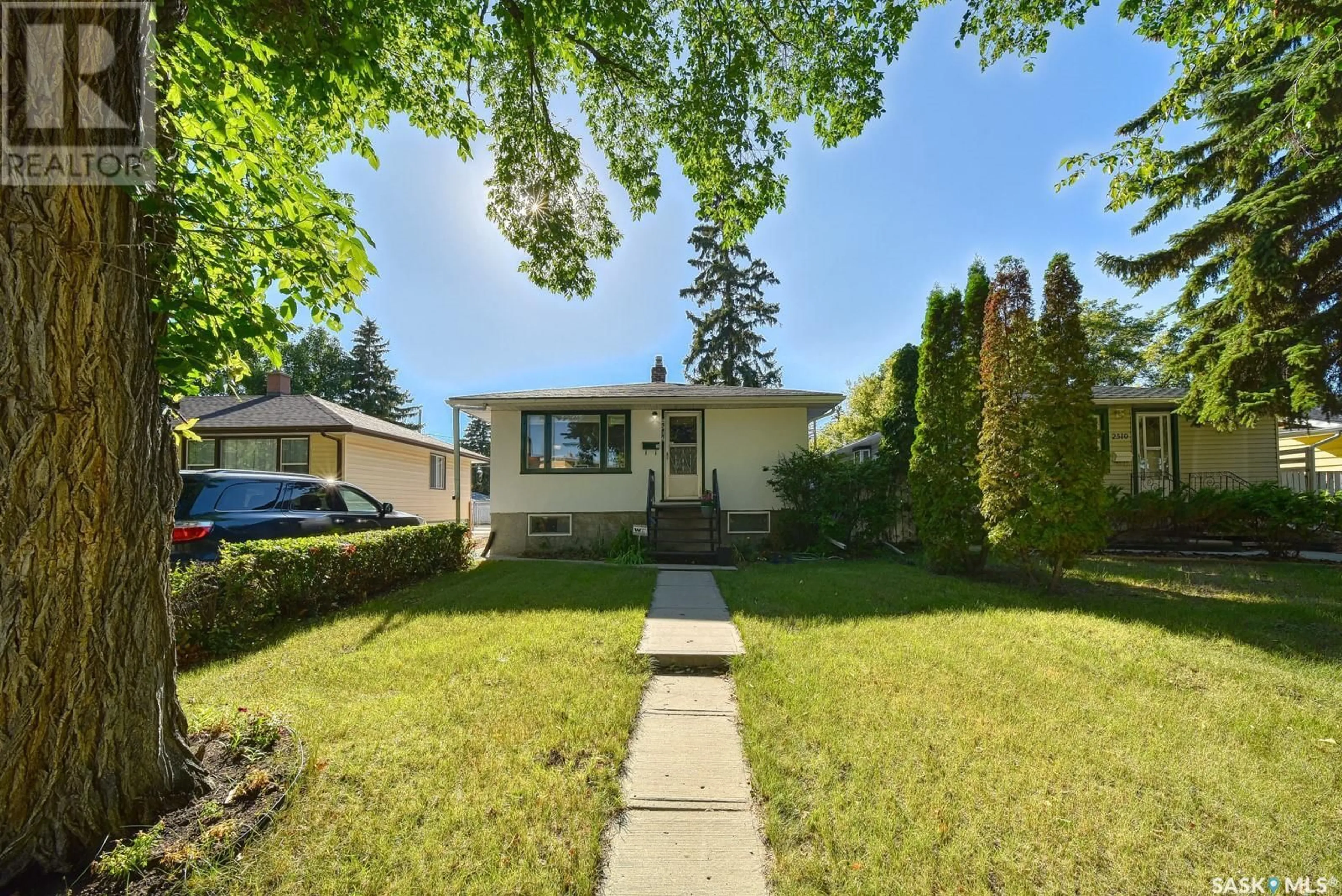 Home with vinyl exterior material, street for 2516 FRANCIS STREET, Regina Saskatchewan S4N2R2