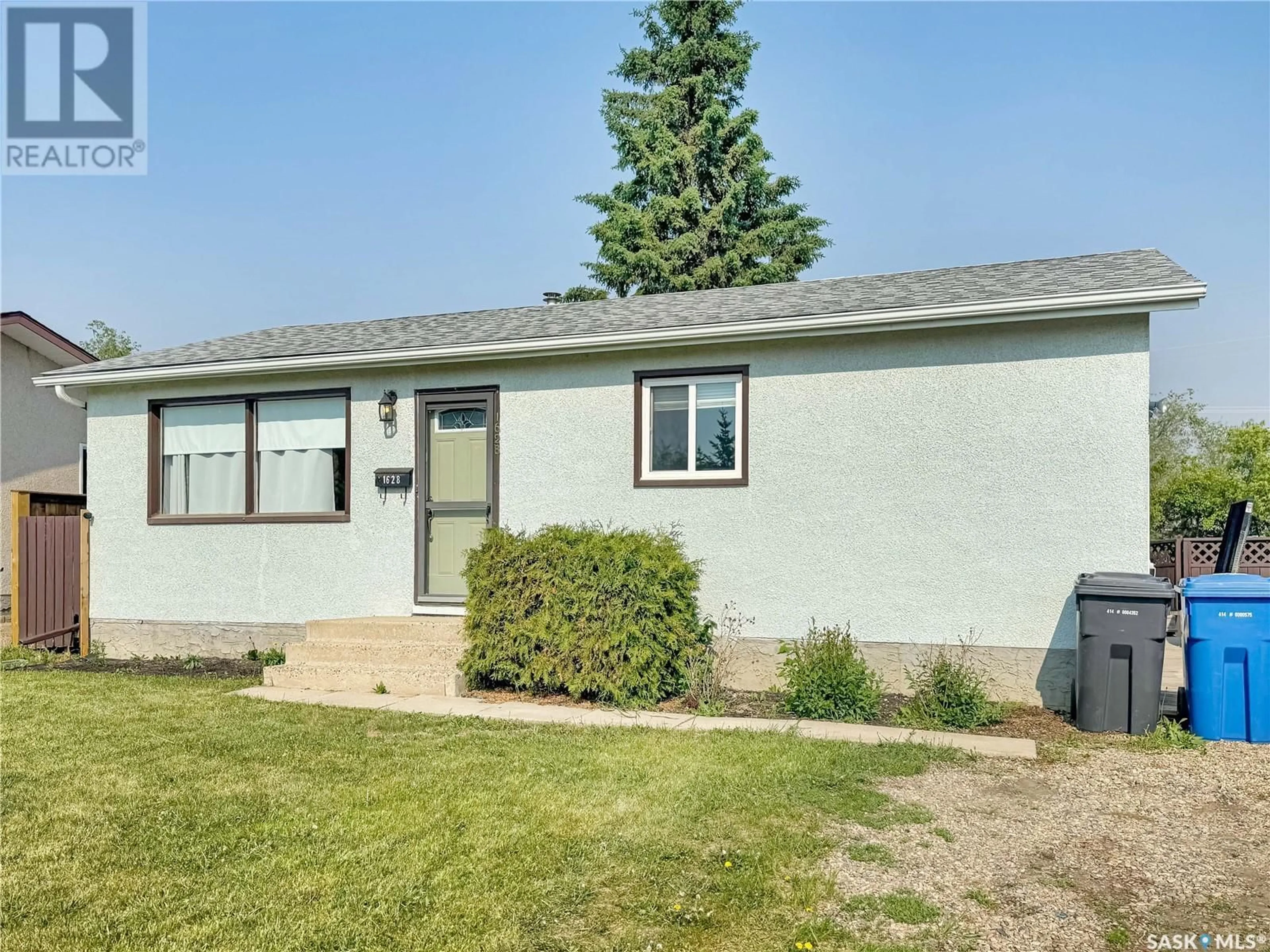 Home with vinyl exterior material, street for 1628 MACKENZIE KING CRESCENT, North Battleford Saskatchewan S9A3E3