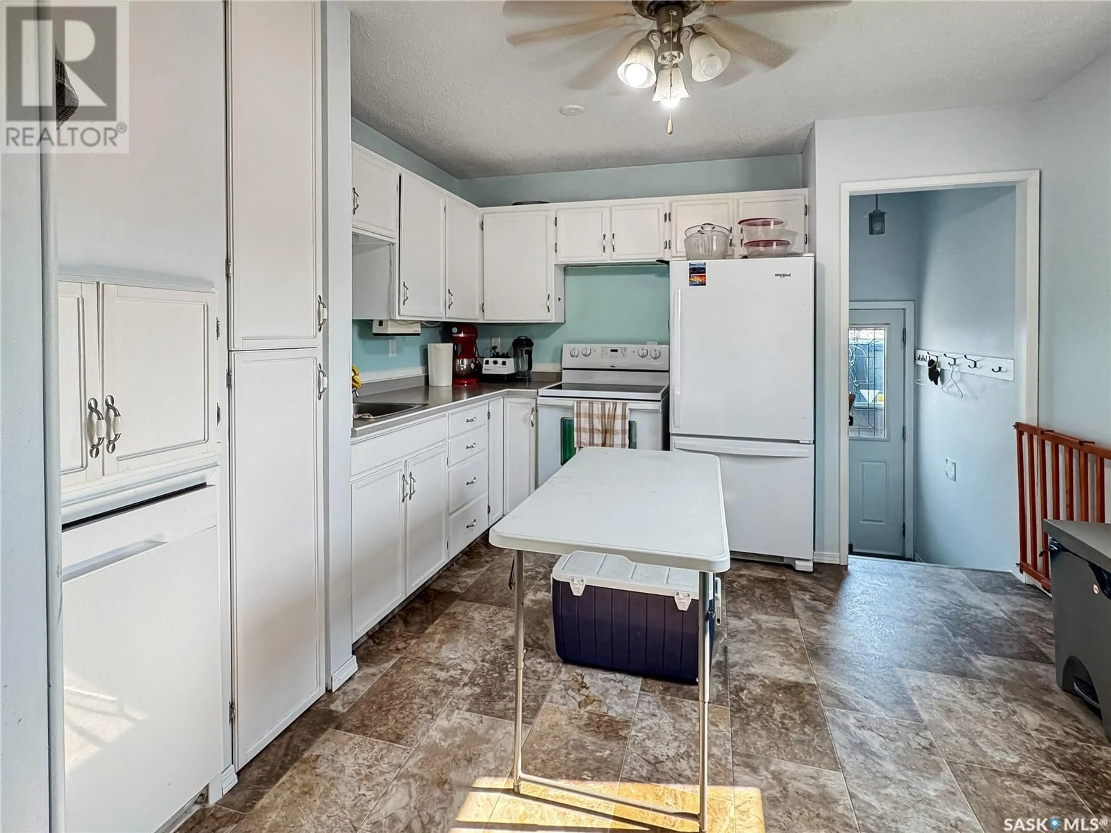 Standard kitchen, ceramic/tile floor for 1628 MACKENZIE KING CRESCENT, North Battleford Saskatchewan S9A3E3
