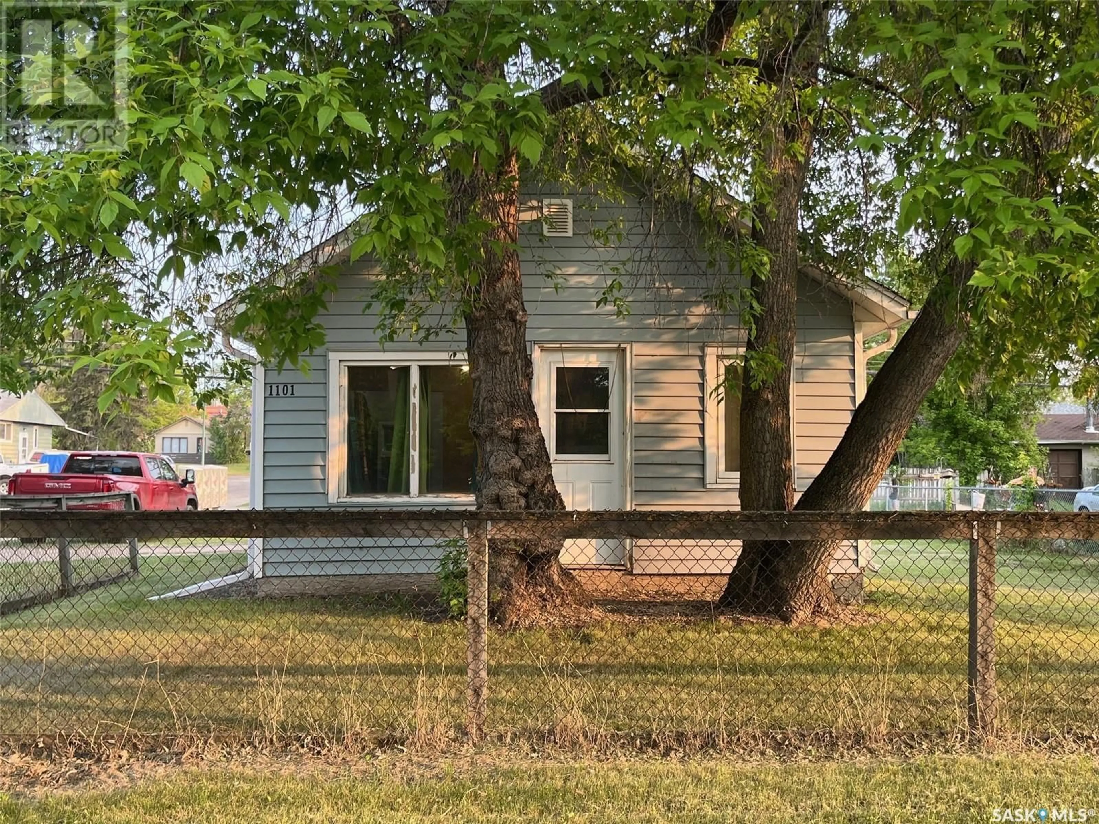 Home with vinyl exterior material, street for 1101 12TH STREET, Prince Albert Saskatchewan S6V3E3