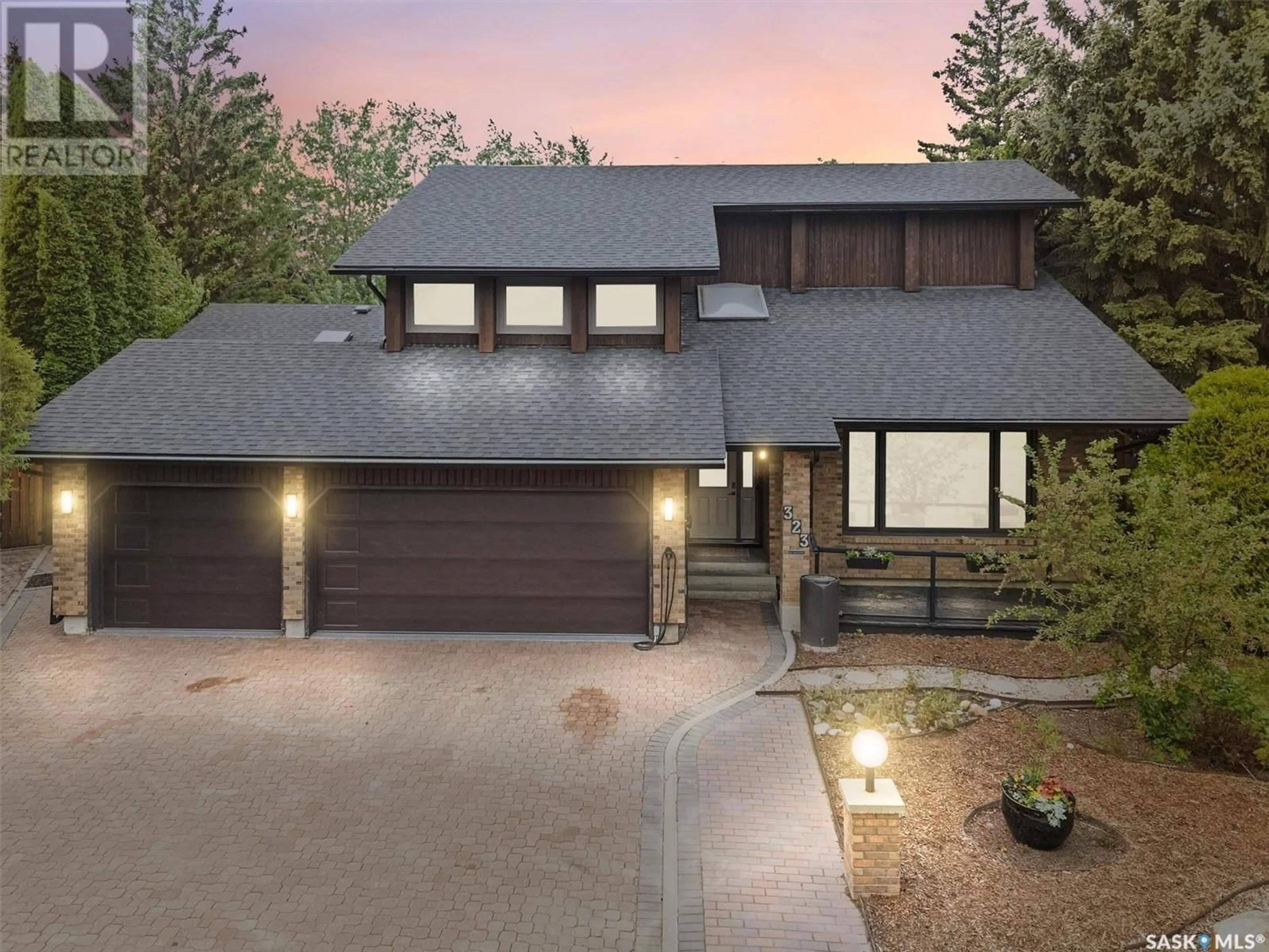 Home with brick exterior material, street for 323 LAKESHORE COURT, Saskatoon Saskatchewan S7J3T6