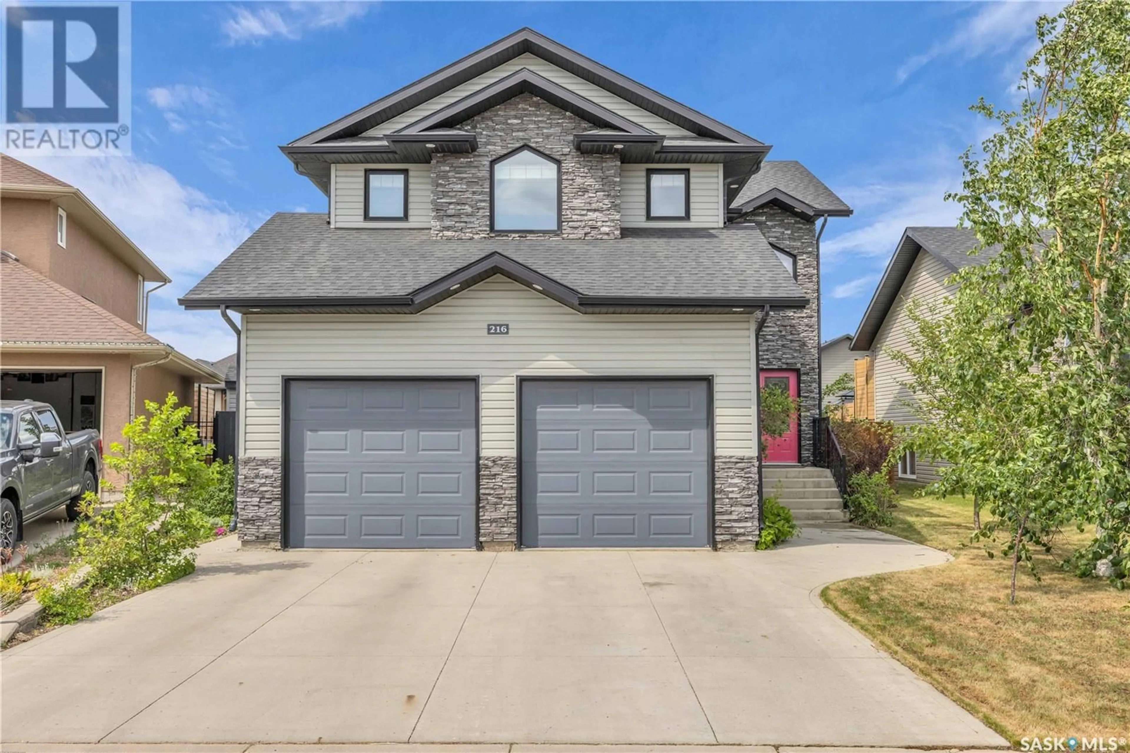 Home with brick exterior material, street for 216 FLOYD COURT, Warman Saskatchewan S0K4S1