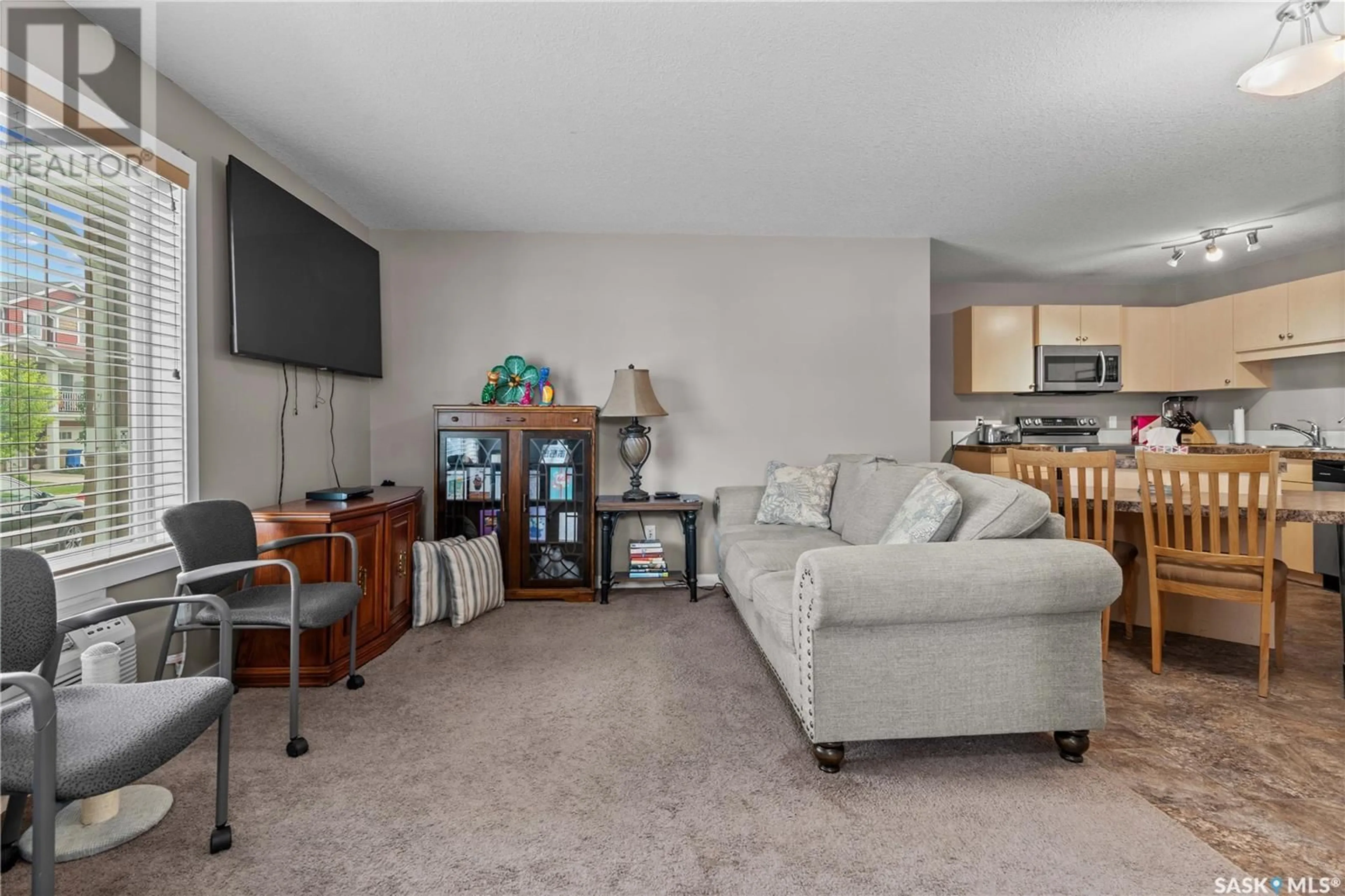 Living room with furniture, unknown for 26 - 5742 GORDON ROAD, Regina Saskatchewan S4W0M1