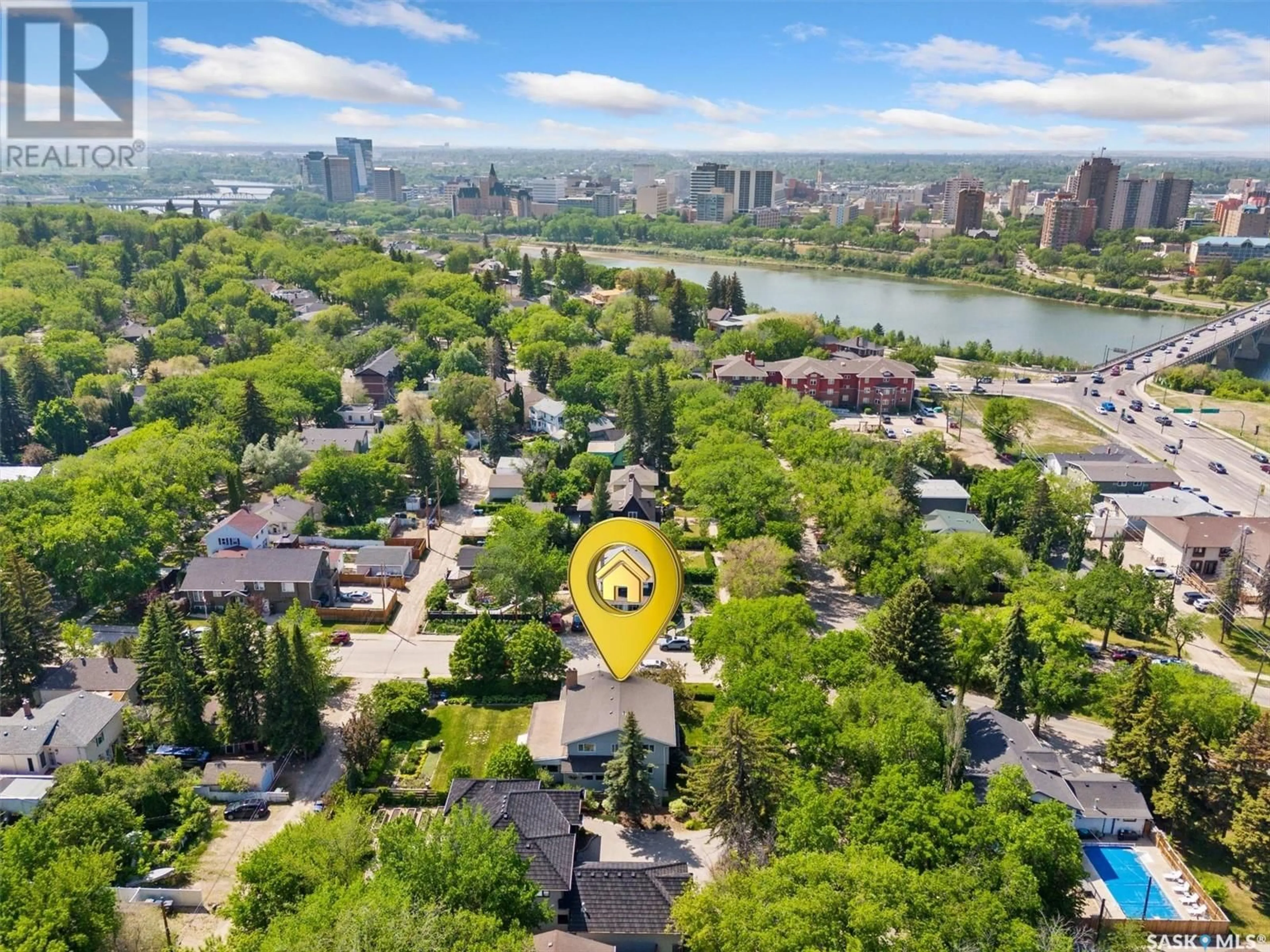 A pic from outside/outdoor area/front of a property/back of a property/a pic from drone, unknown for 1104 ELLIOTT STREET, Saskatoon Saskatchewan S7N0V3