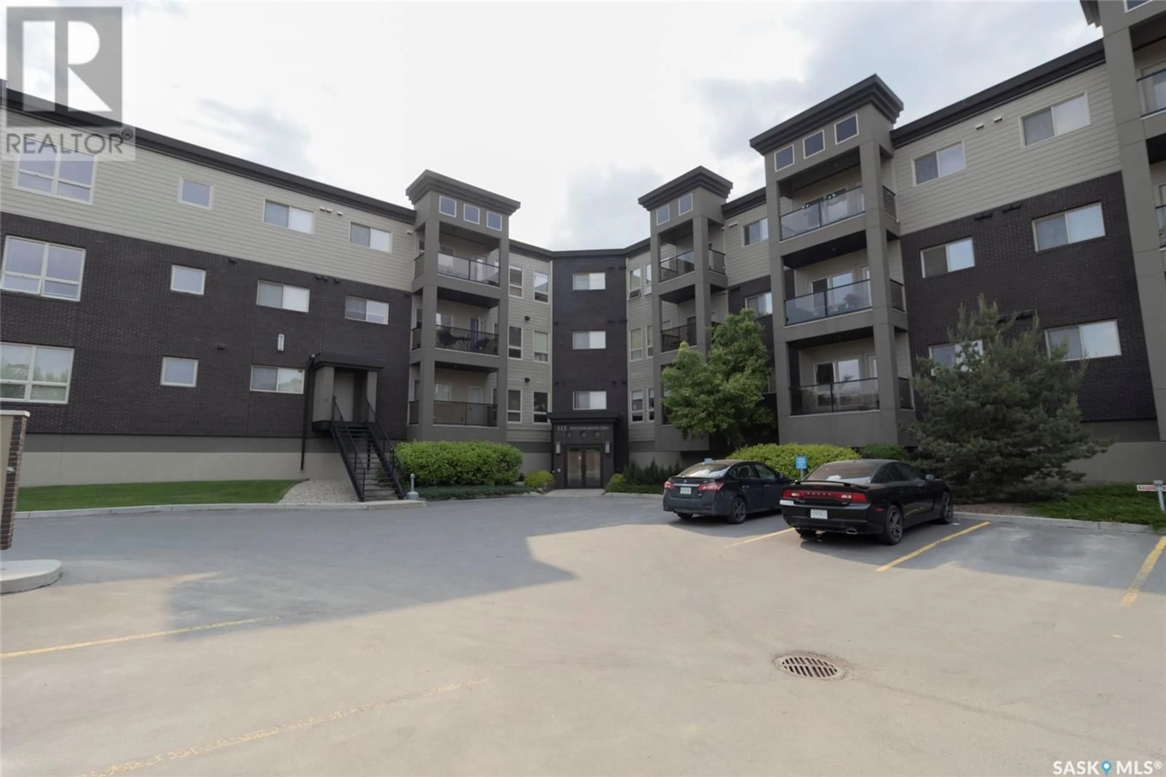A pic from outside/outdoor area/front of a property/back of a property/a pic from drone, unknown for 204 115 WILLOWGROVE CRESCENT, Saskatoon Saskatchewan S7W0N4