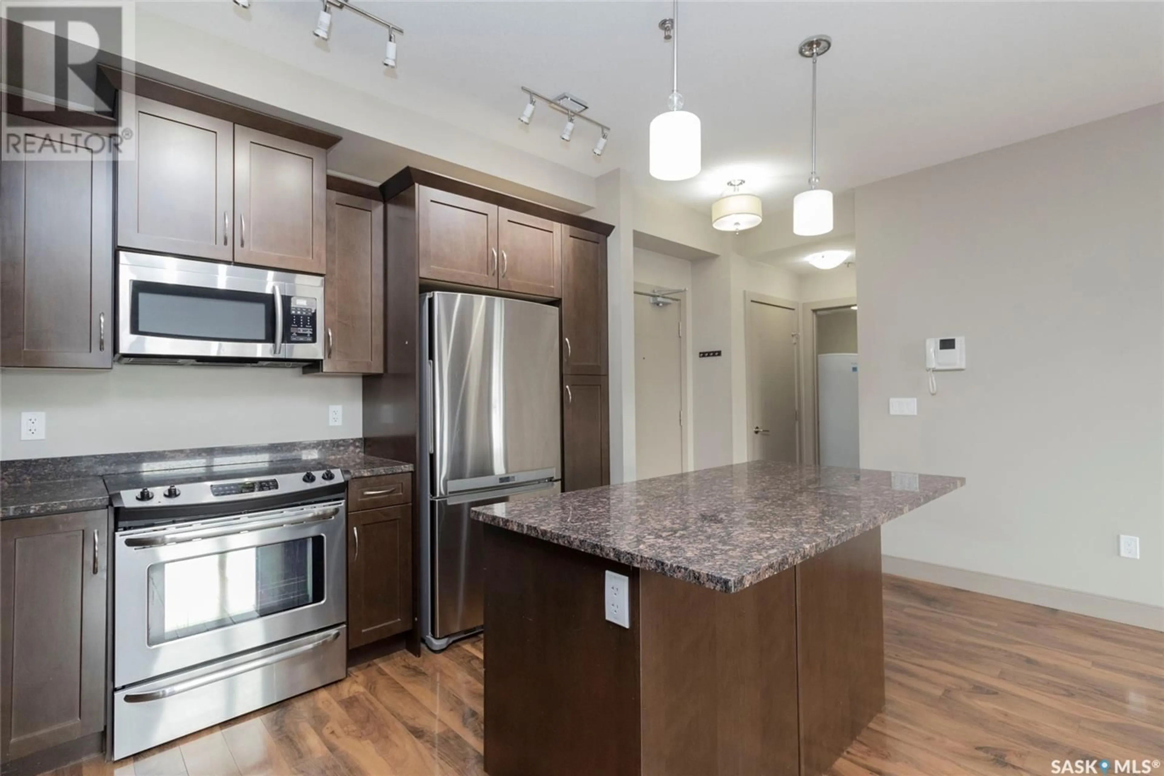 Open concept kitchen, unknown for 204 115 WILLOWGROVE CRESCENT, Saskatoon Saskatchewan S7W0N4