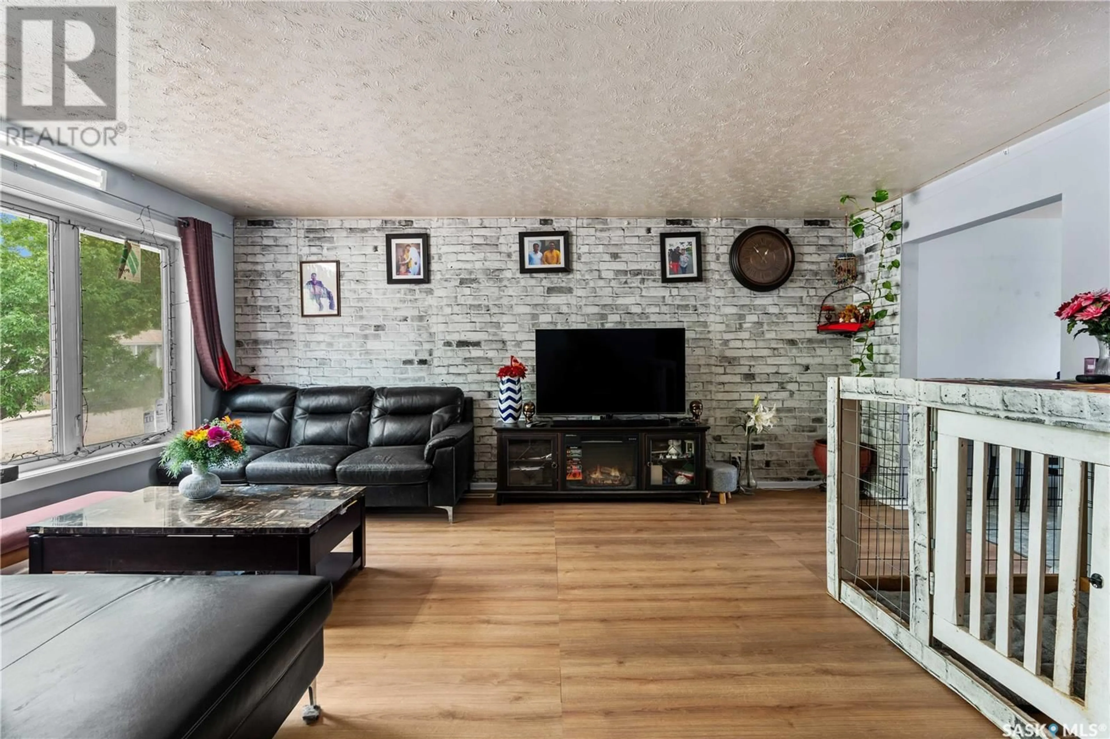Living room with furniture, unknown for 1440 RUPERT STREET, Regina Saskatchewan S4N1V8