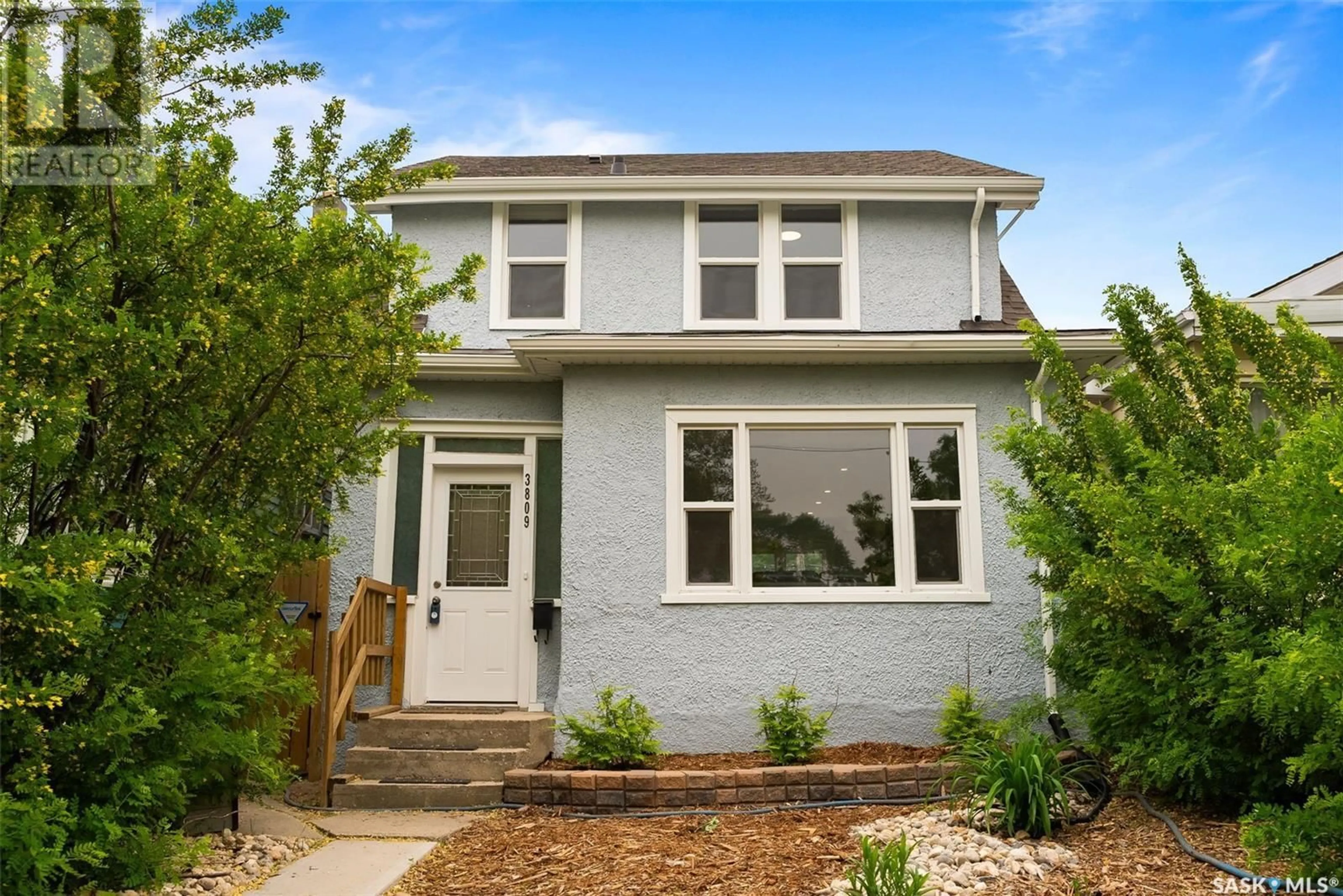 Home with brick exterior material, street for 3809 VICTORIA AVENUE, Regina Saskatchewan S4T1M6
