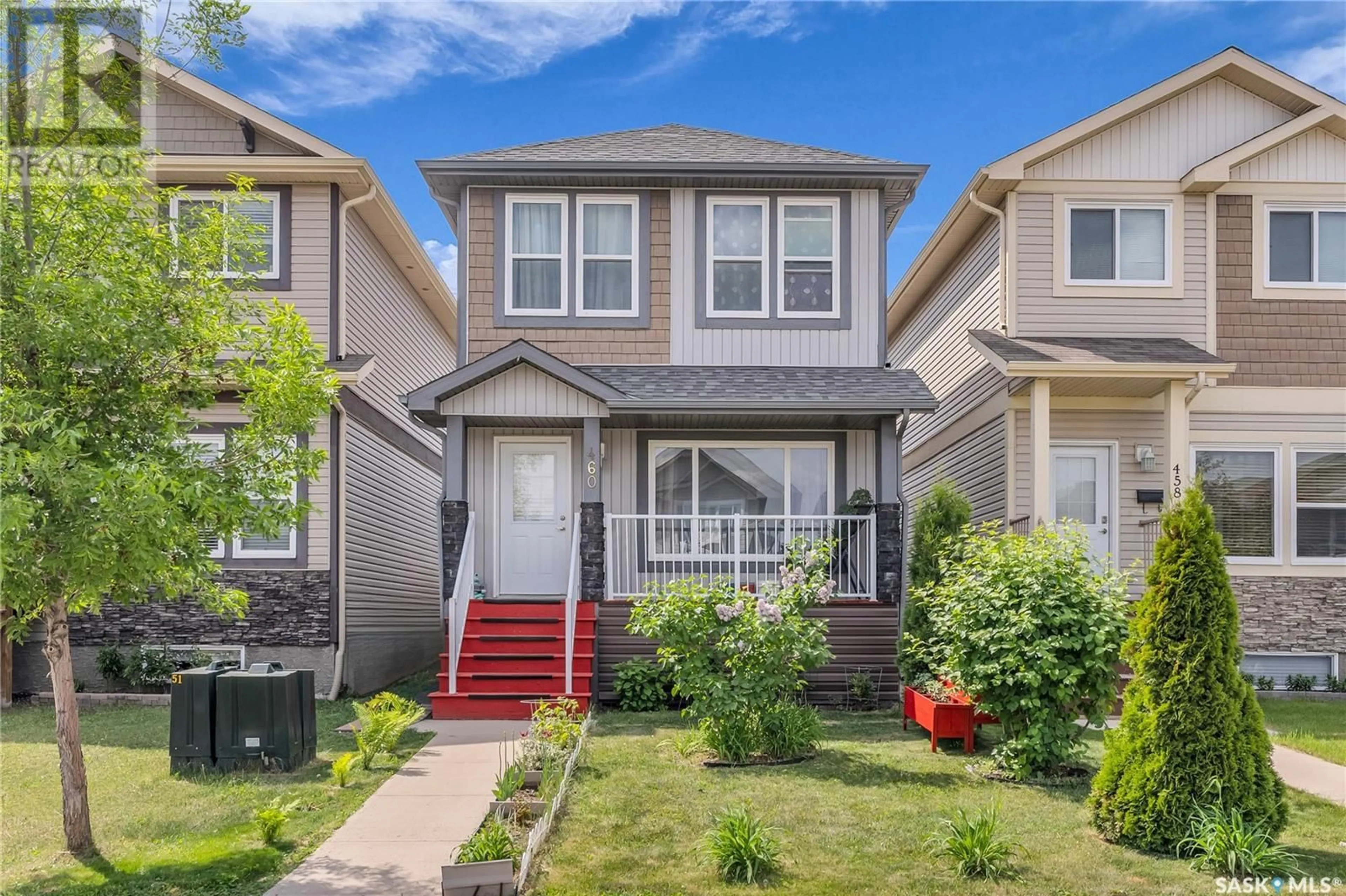 Home with vinyl exterior material, street for 460 COAD MANOR, Saskatoon Saskatchewan S7R0K2