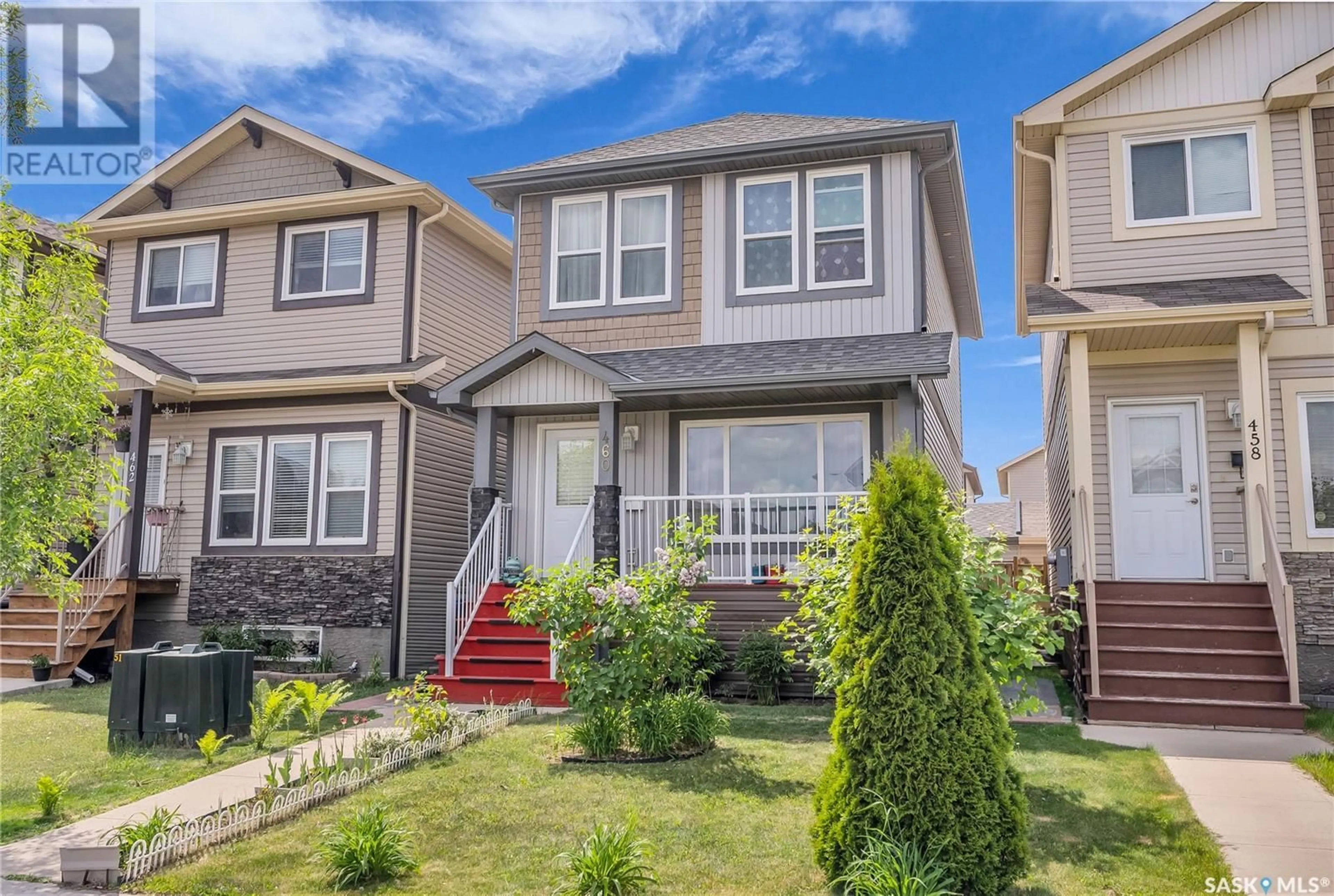 Home with vinyl exterior material, street for 460 COAD MANOR, Saskatoon Saskatchewan S7R0K2