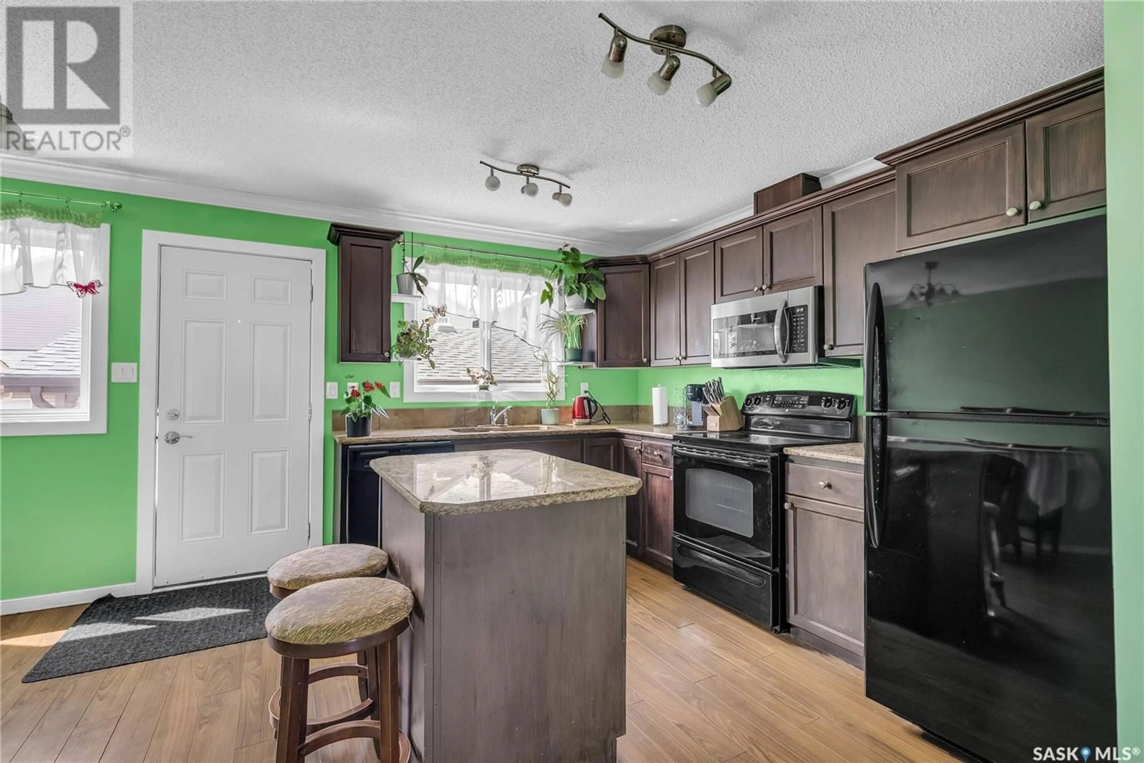 Open concept kitchen, unknown for 460 COAD MANOR, Saskatoon Saskatchewan S7R0K2