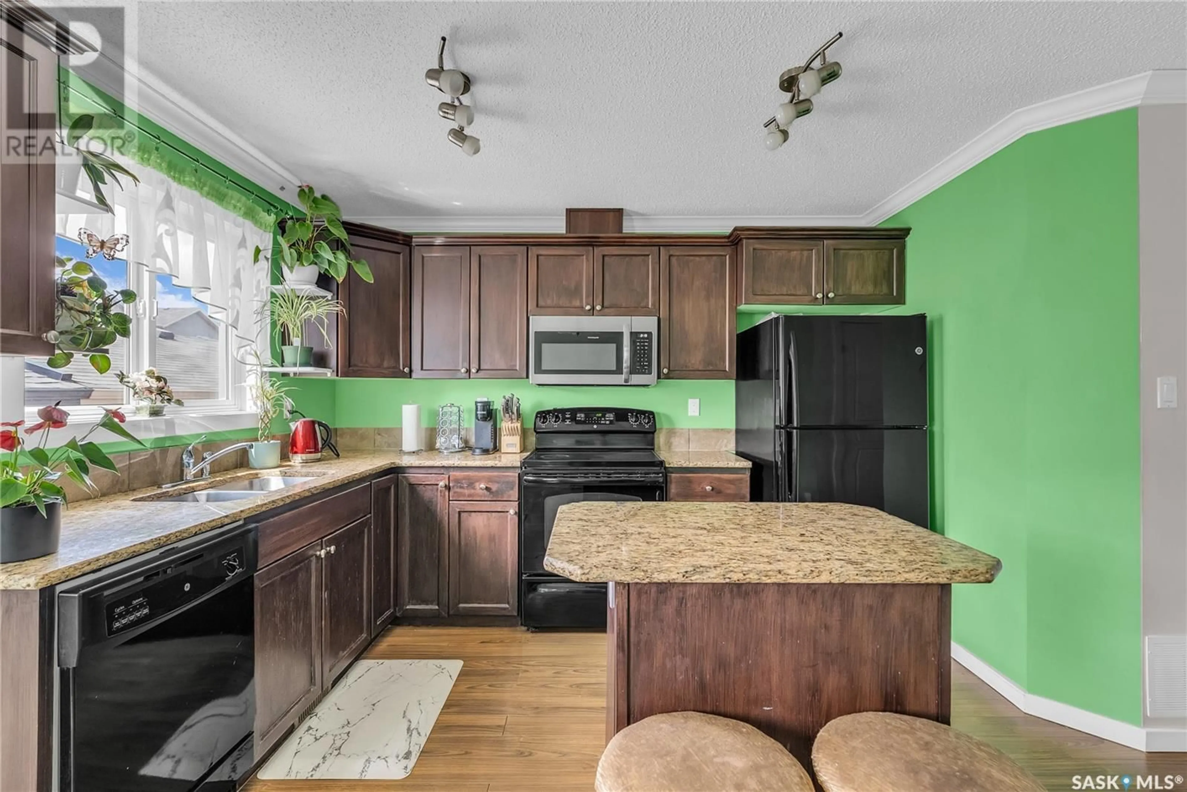 Open concept kitchen, unknown for 460 COAD MANOR, Saskatoon Saskatchewan S7R0K2