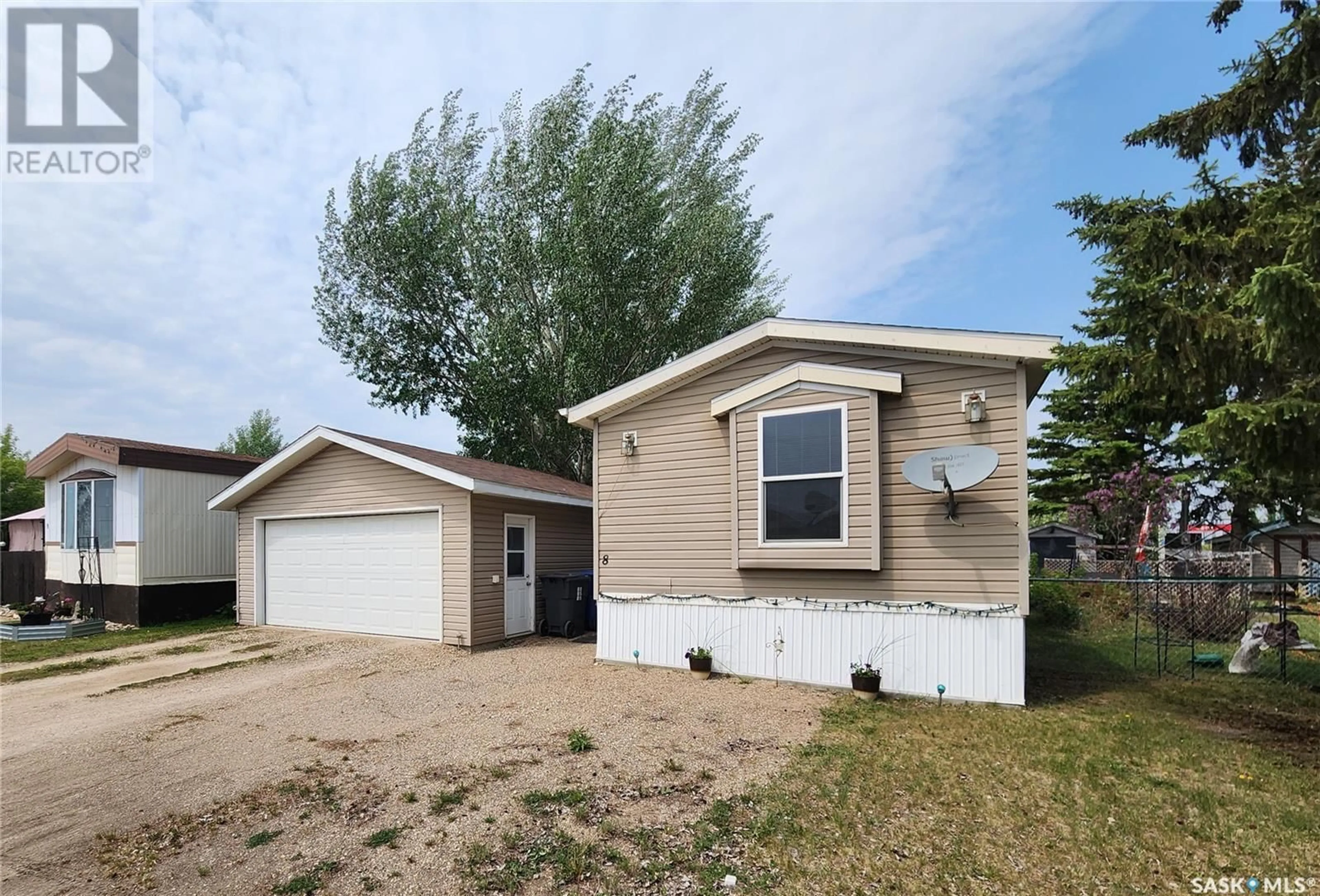 Home with vinyl exterior material, street for 8 555 DIELSCHNEIDER ROAD, Melville Saskatchewan S0A2P0