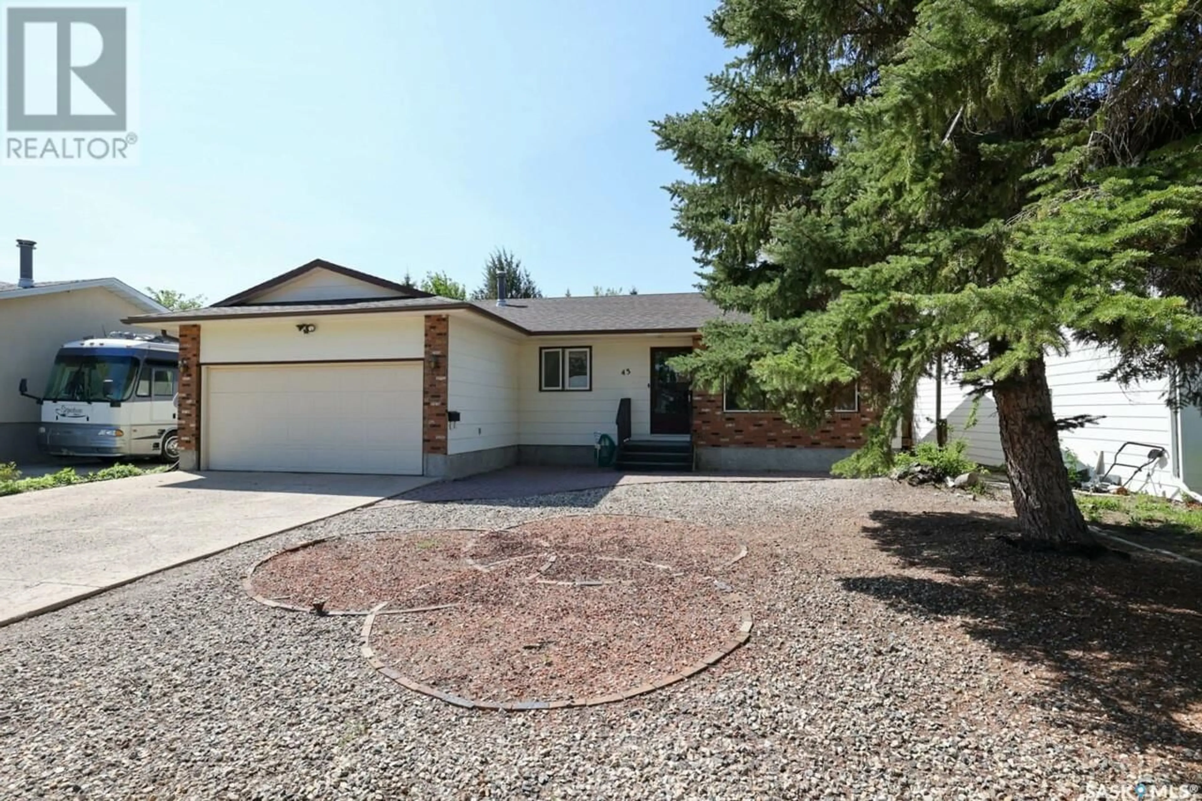 Home with vinyl exterior material, street for 43 HAWKES AVENUE, Regina Saskatchewan S4X1B3