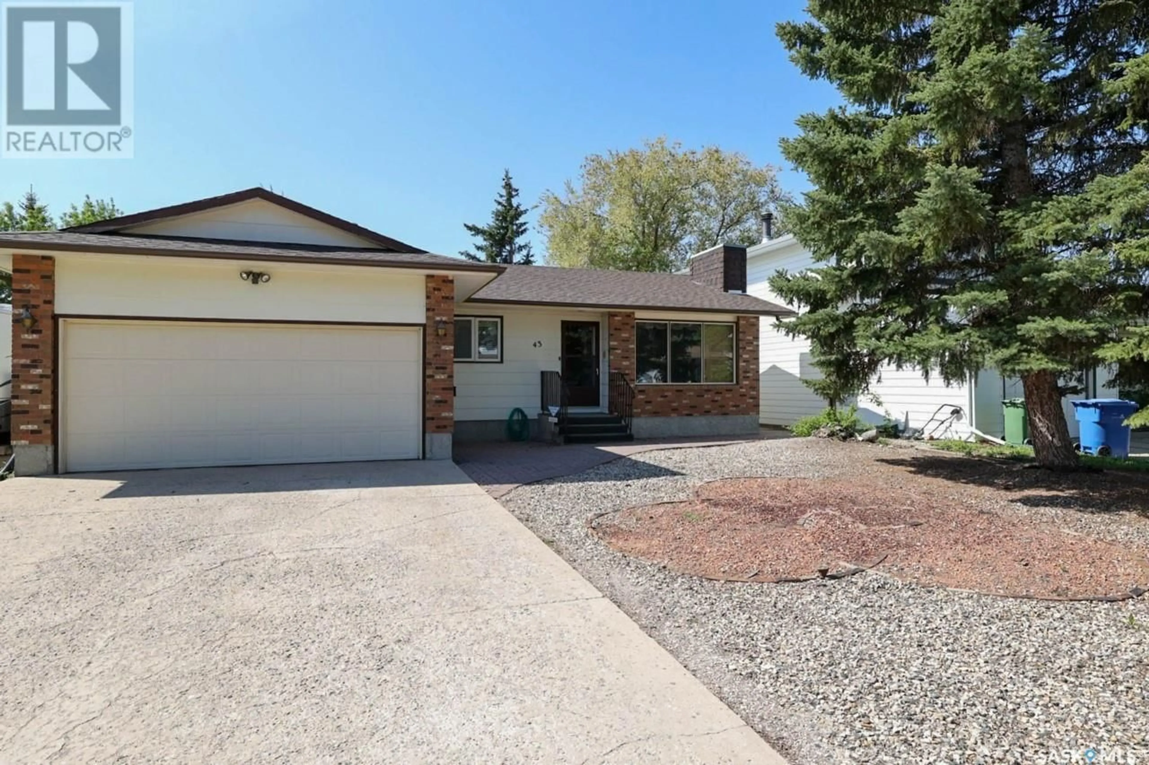 Home with vinyl exterior material, street for 43 HAWKES AVENUE, Regina Saskatchewan S4X1B3