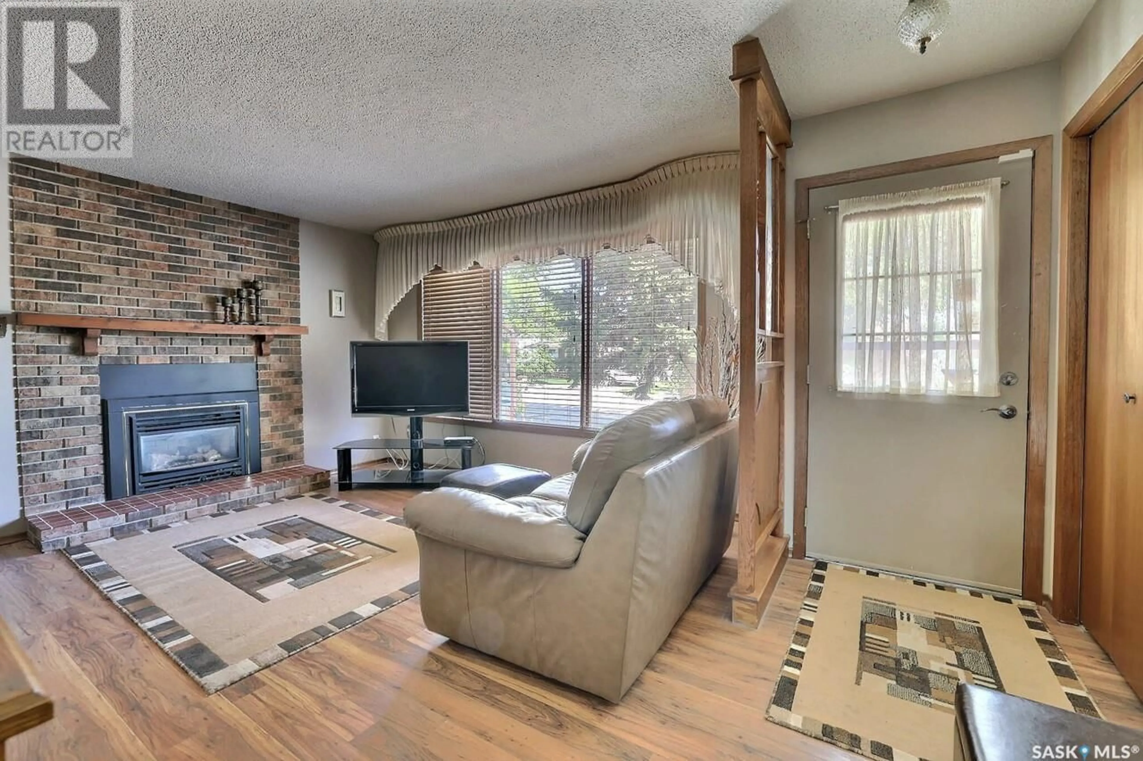 Living room with furniture, unknown for 43 HAWKES AVENUE, Regina Saskatchewan S4X1B3