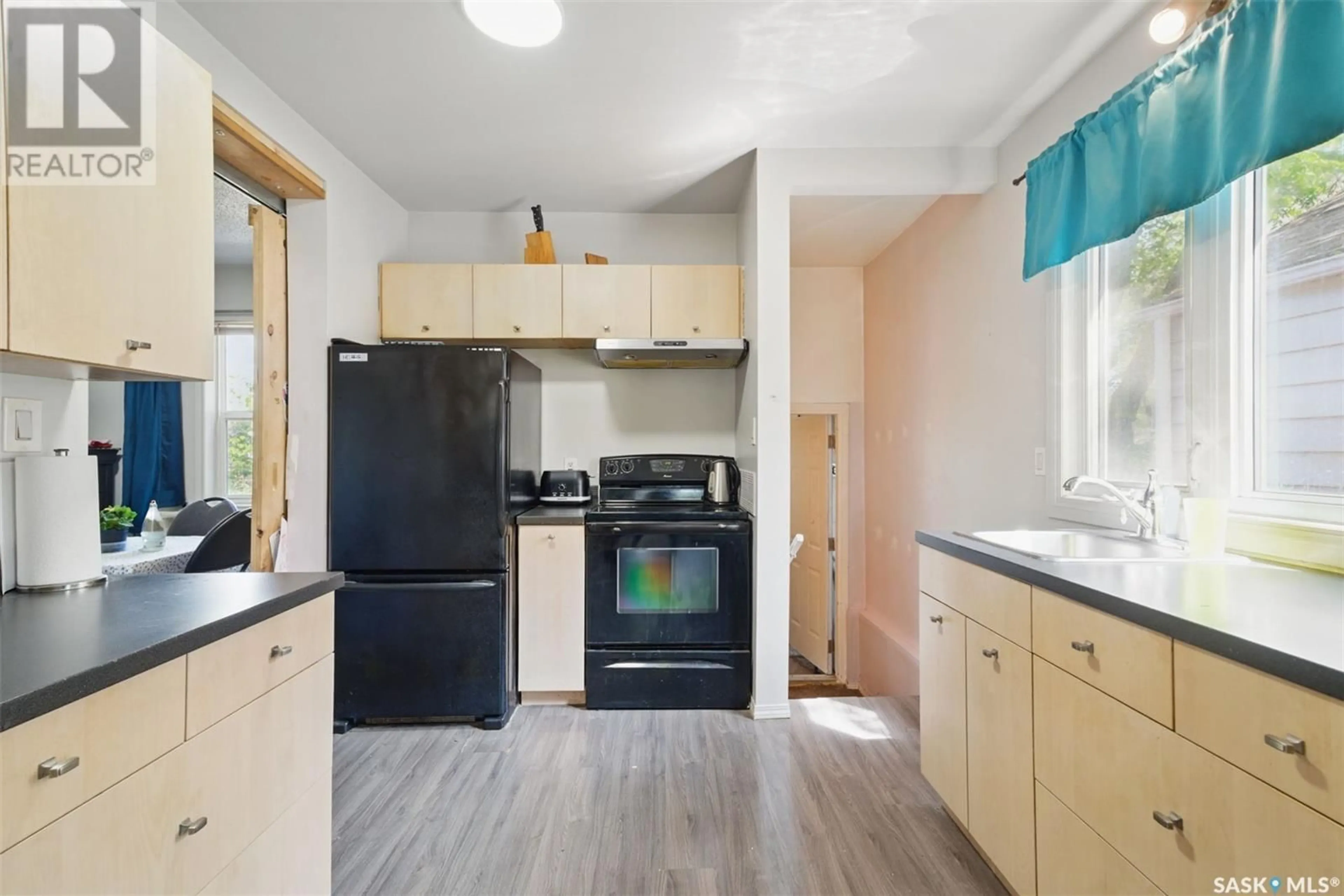 Standard kitchen, wood/laminate floor for 126 J AVENUE, Saskatoon Saskatchewan S7M2A1