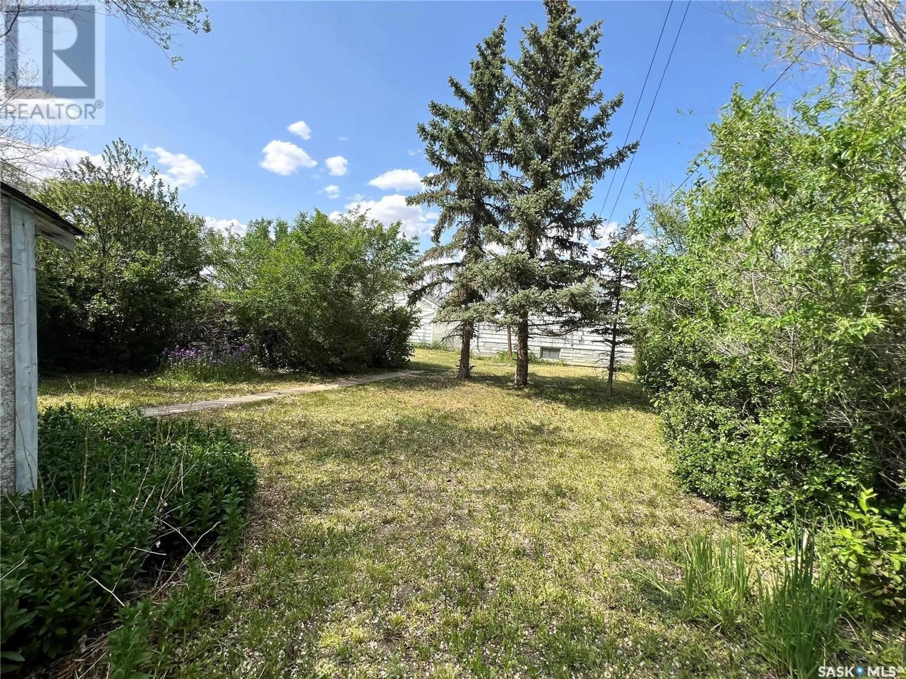 A pic from outside/outdoor area/front of a property/back of a property/a pic from drone, unknown for 312 7TH AVENUE, Rosetown Saskatchewan S0L2V0