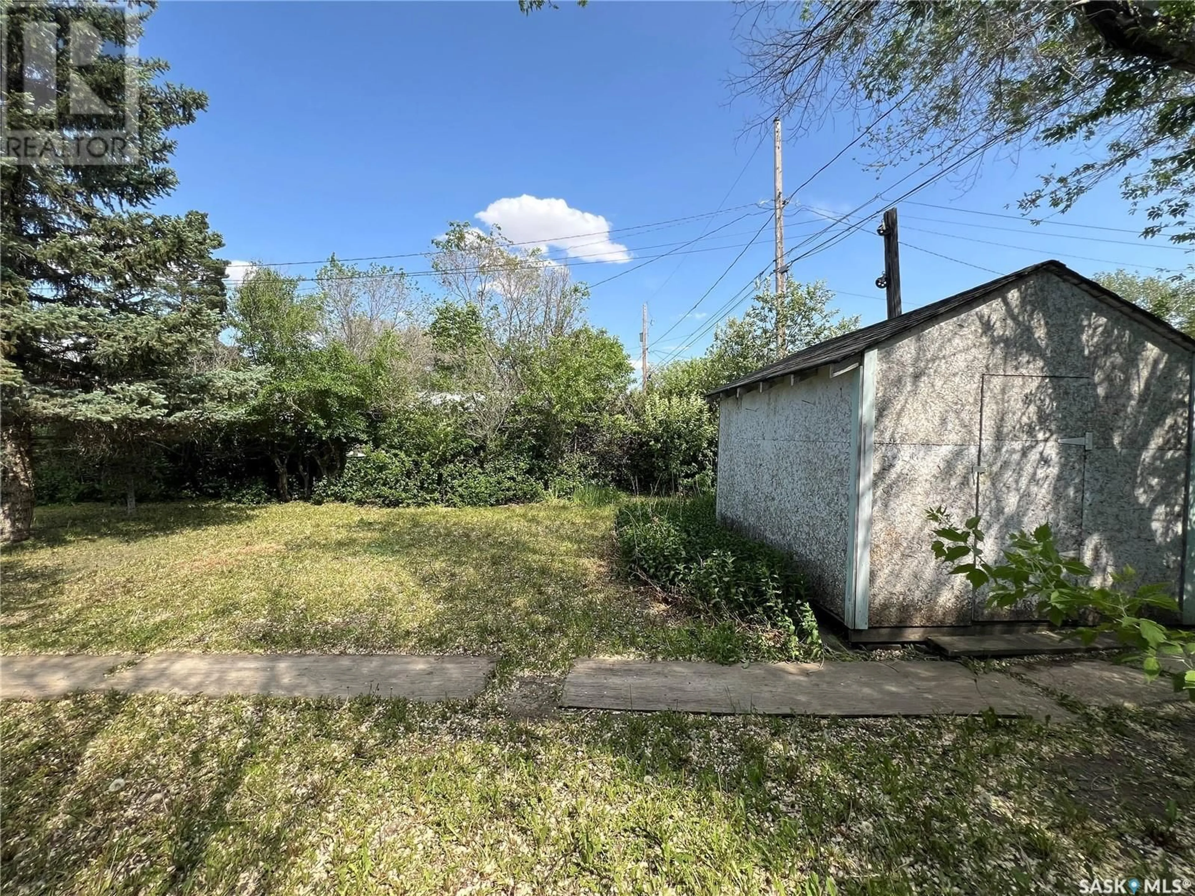 A pic from outside/outdoor area/front of a property/back of a property/a pic from drone, street for 312 7TH AVENUE, Rosetown Saskatchewan S0L2V0