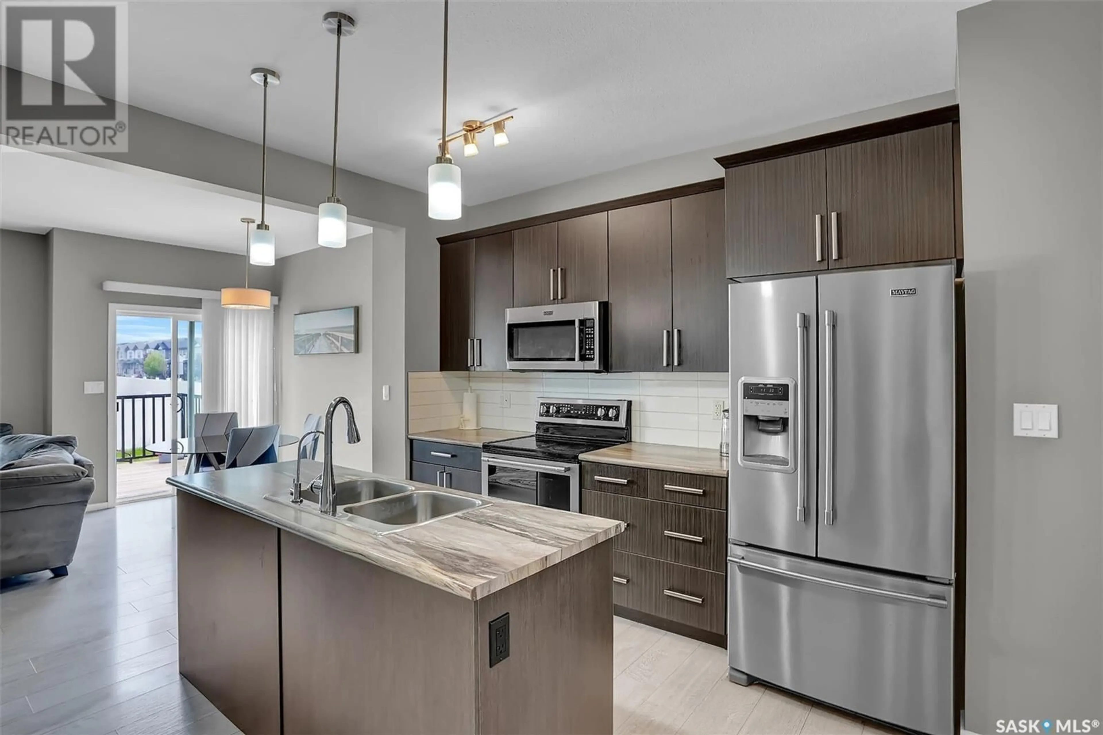 Open concept kitchen, ceramic/tile floor for 3363 GREEN SANDCHERRY STREET, Regina Saskatchewan S4V3M2