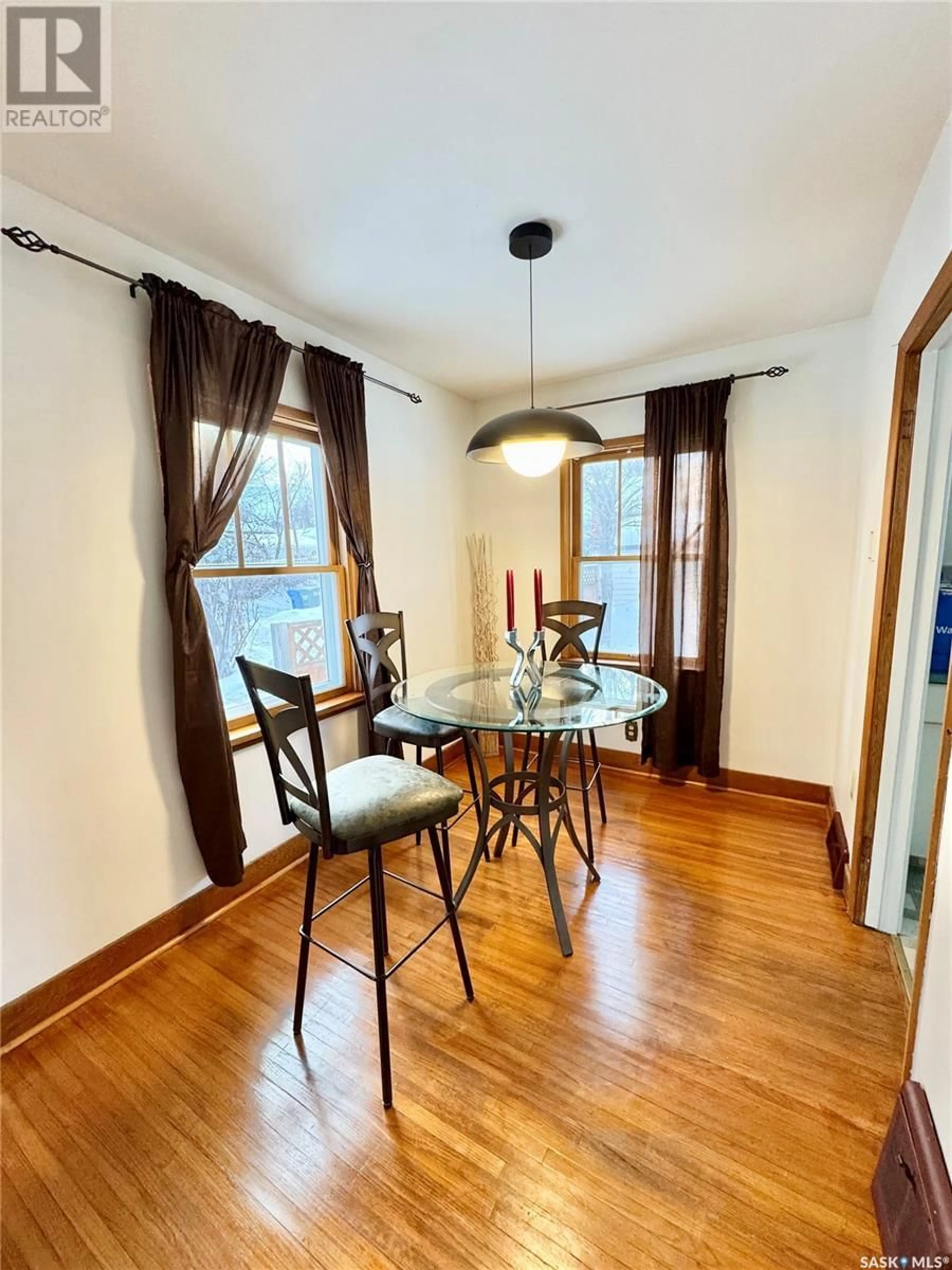 Dining room, wood/laminate floor for 1810 CENTRAL AVENUE, Prince Albert Saskatchewan S6V4W9