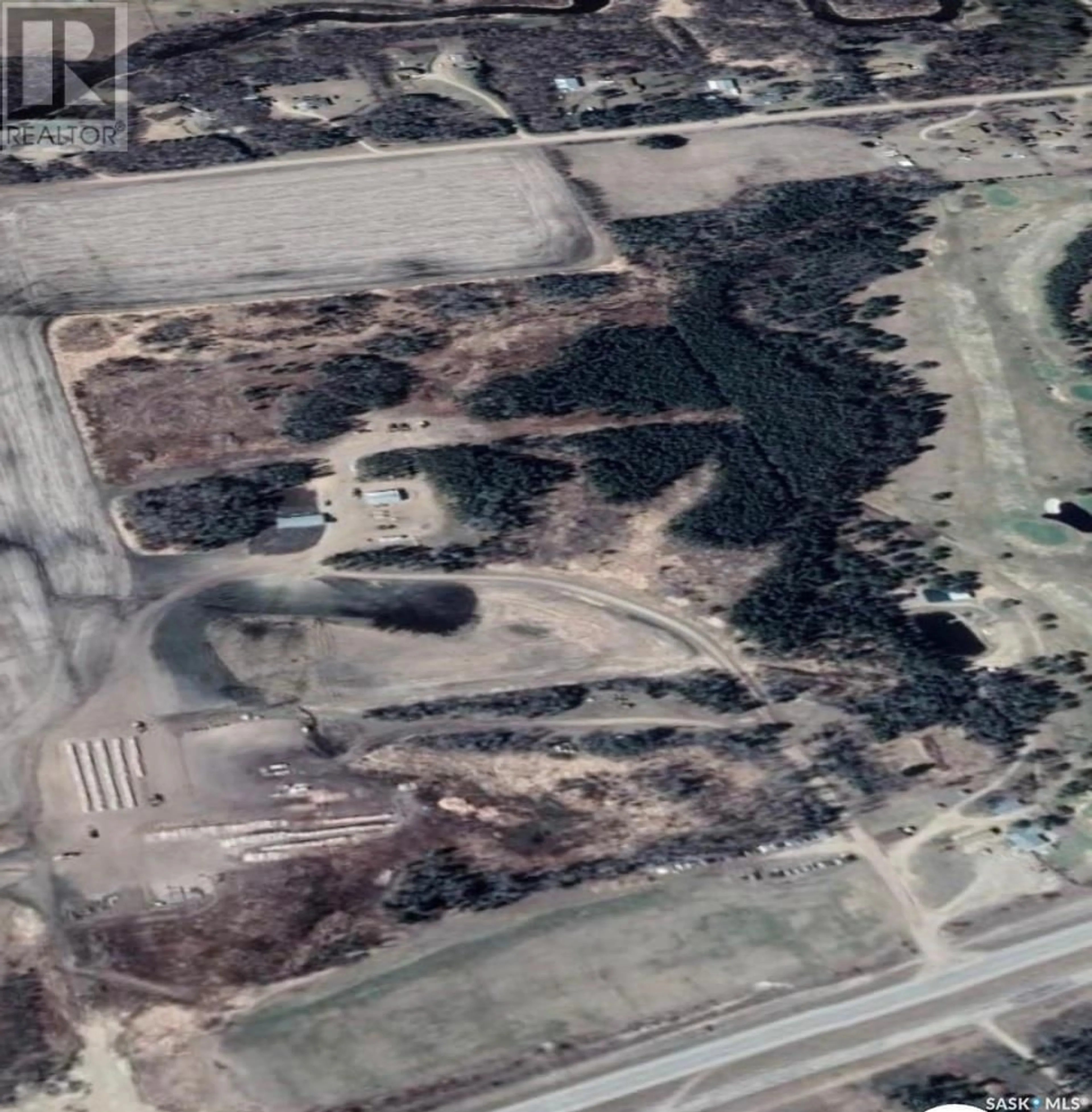 A pic from outside/outdoor area/front of a property/back of a property/a pic from drone, street for MORTON ACREAGE, Hudson Bay Rm No. 394 Saskatchewan S0E0Y0