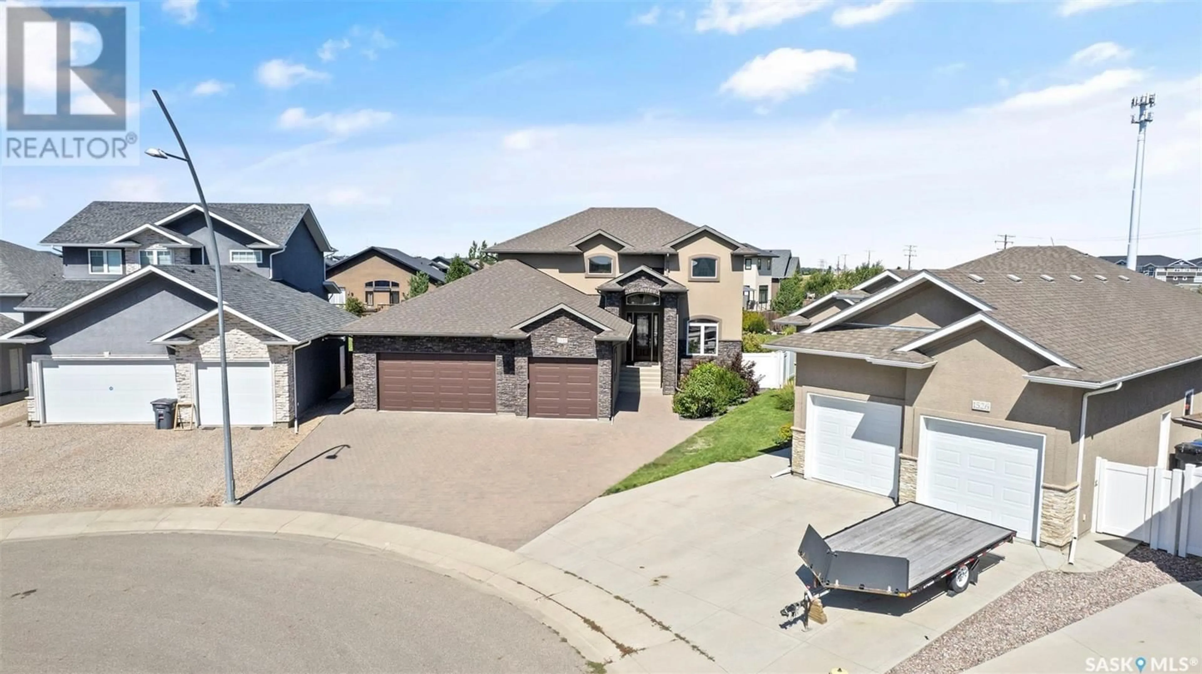A pic from outside/outdoor area/front of a property/back of a property/a pic from drone, street for 1530 POHORECKY COURT, Saskatoon Saskatchewan S7S1N1