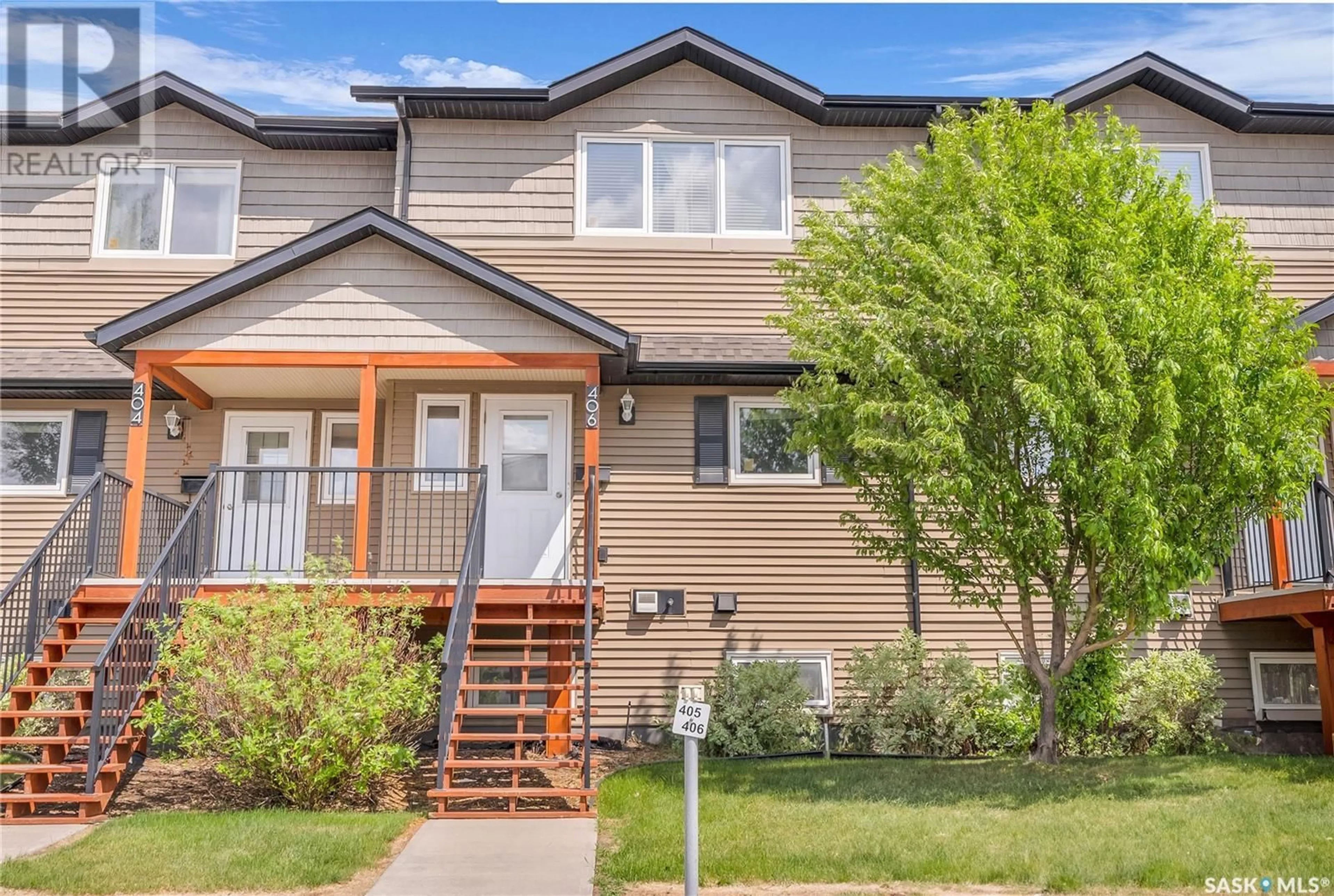 Home with vinyl exterior material, street for 406 - 110 SHILLINGTON CRESCENT, Saskatoon Saskatchewan S7M3Z8