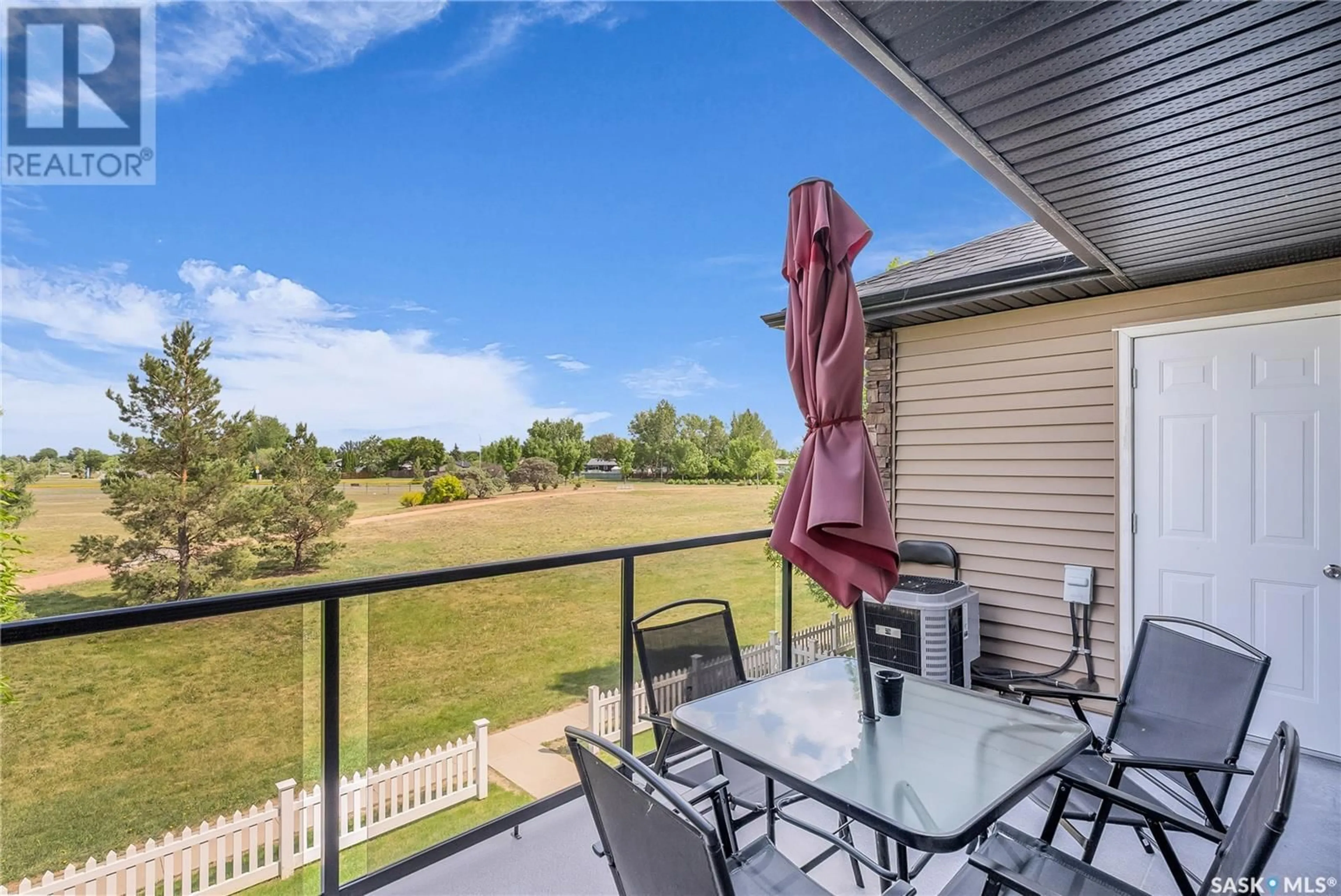 Patio, water/lake/river/ocean view for 406 - 110 SHILLINGTON CRESCENT, Saskatoon Saskatchewan S7M3Z8
