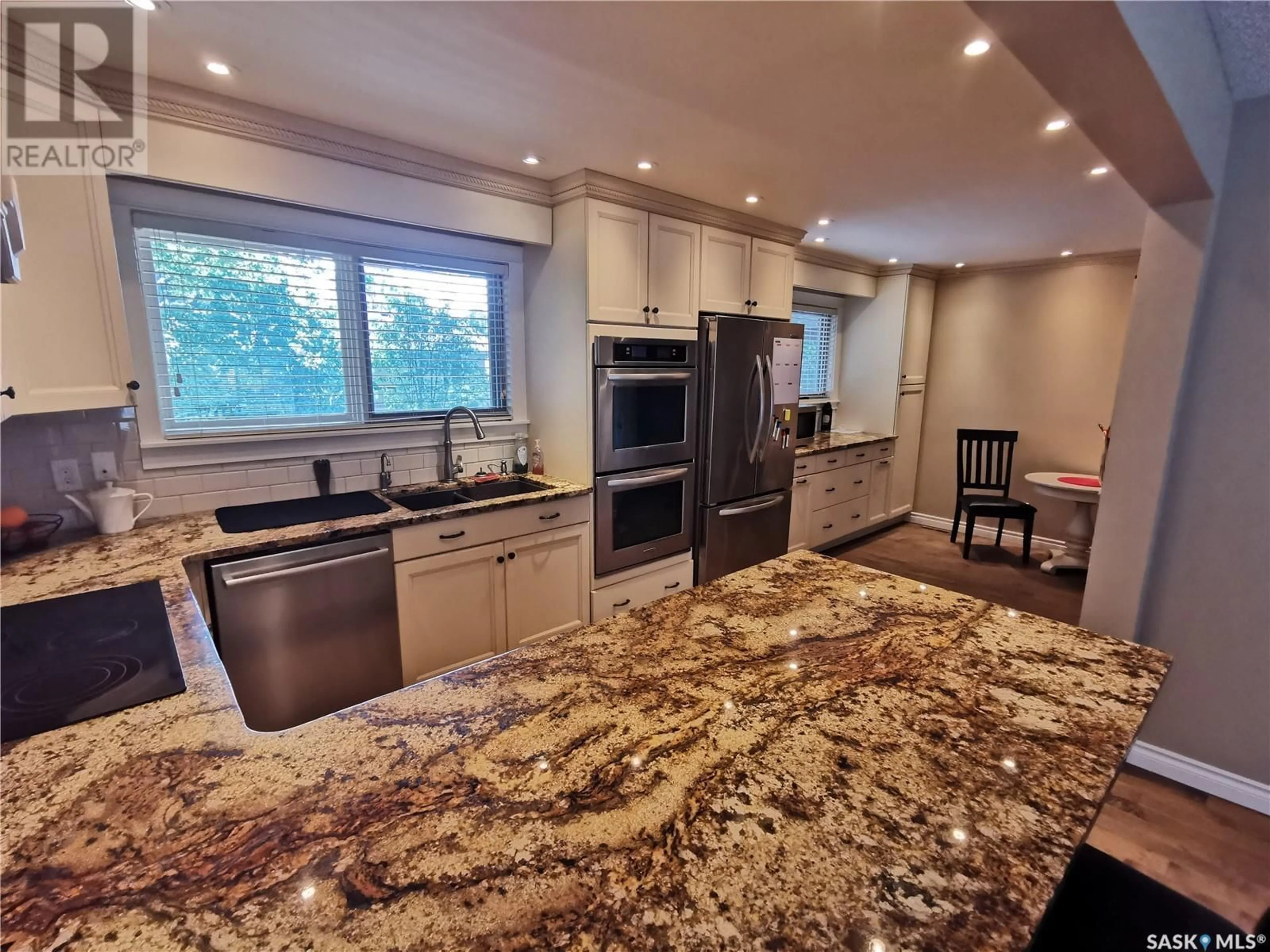 Open concept kitchen, ceramic/tile floor for 314 DORE WAY, Saskatoon Saskatchewan S7K4X9