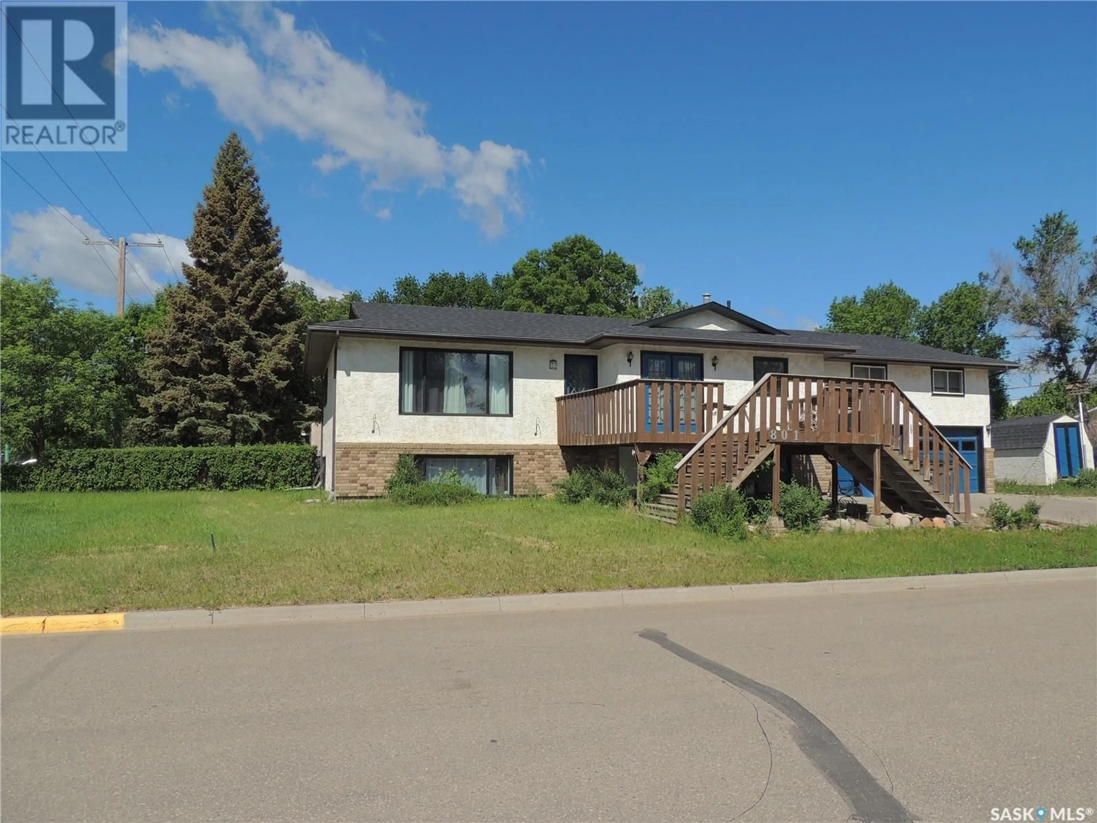 Home with vinyl exterior material, street for 801 KING STREET, Estevan Saskatchewan S4A1L2