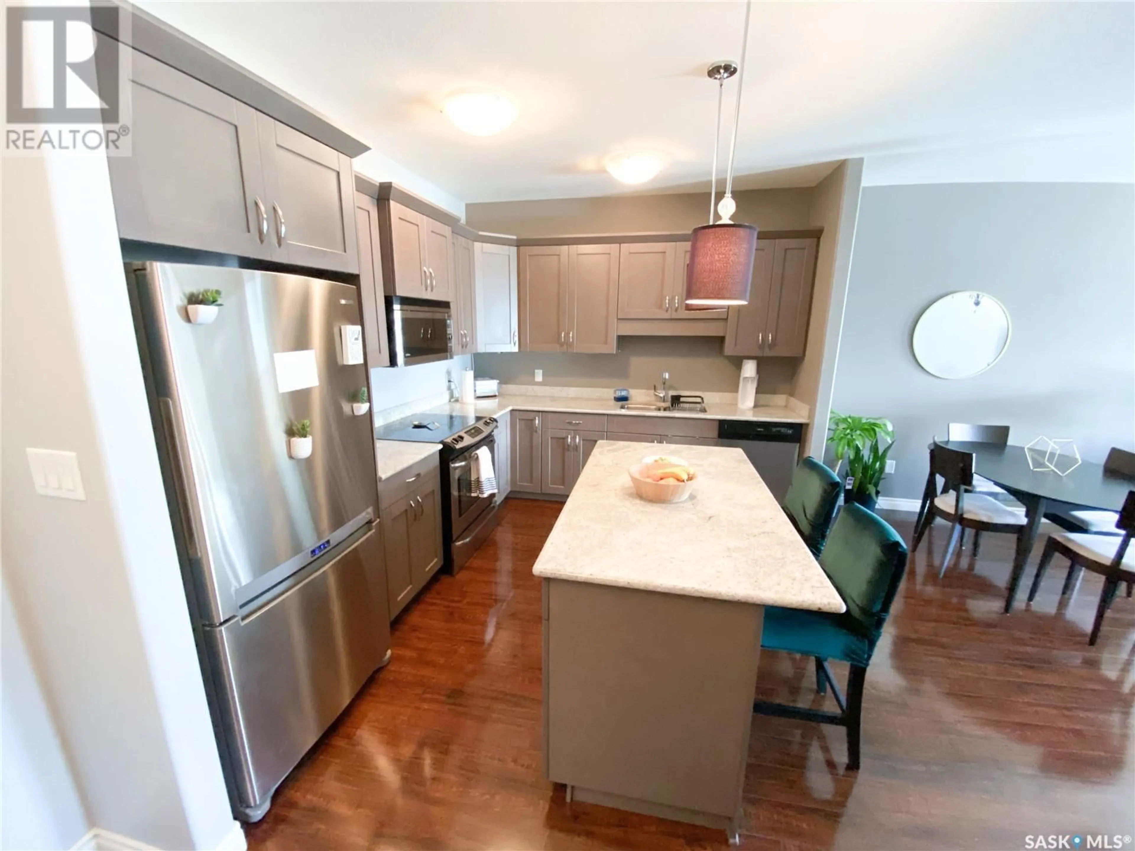 Open concept kitchen, unknown for 110 2730 MAIN STREET, Saskatoon Saskatchewan S7H0M3