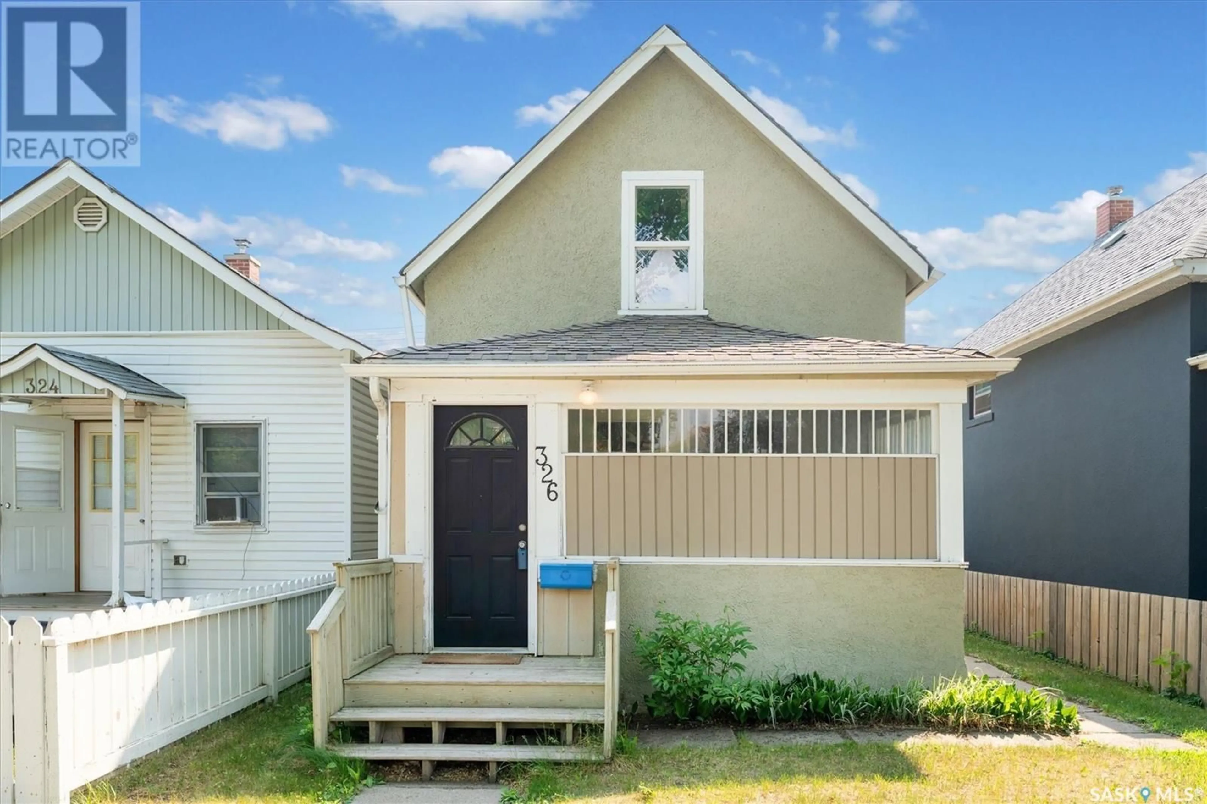 Home with vinyl exterior material, street for 326 I AVENUE, Saskatoon Saskatchewan S7M1Y2