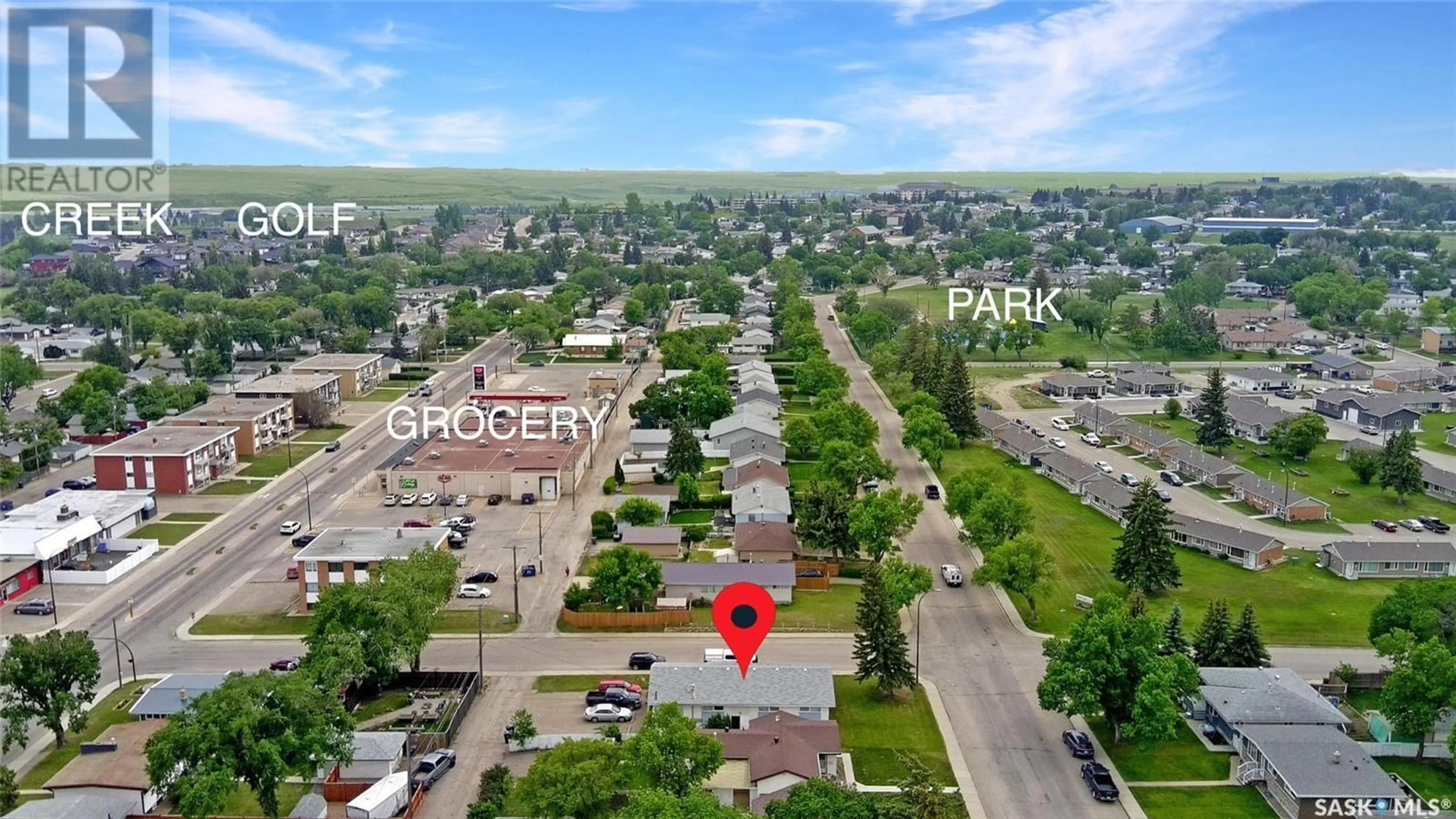 A pic from outside/outdoor area/front of a property/back of a property/a pic from drone, street for 275 CENTRAL AVENUE, Swift Current Saskatchewan S9H3G2