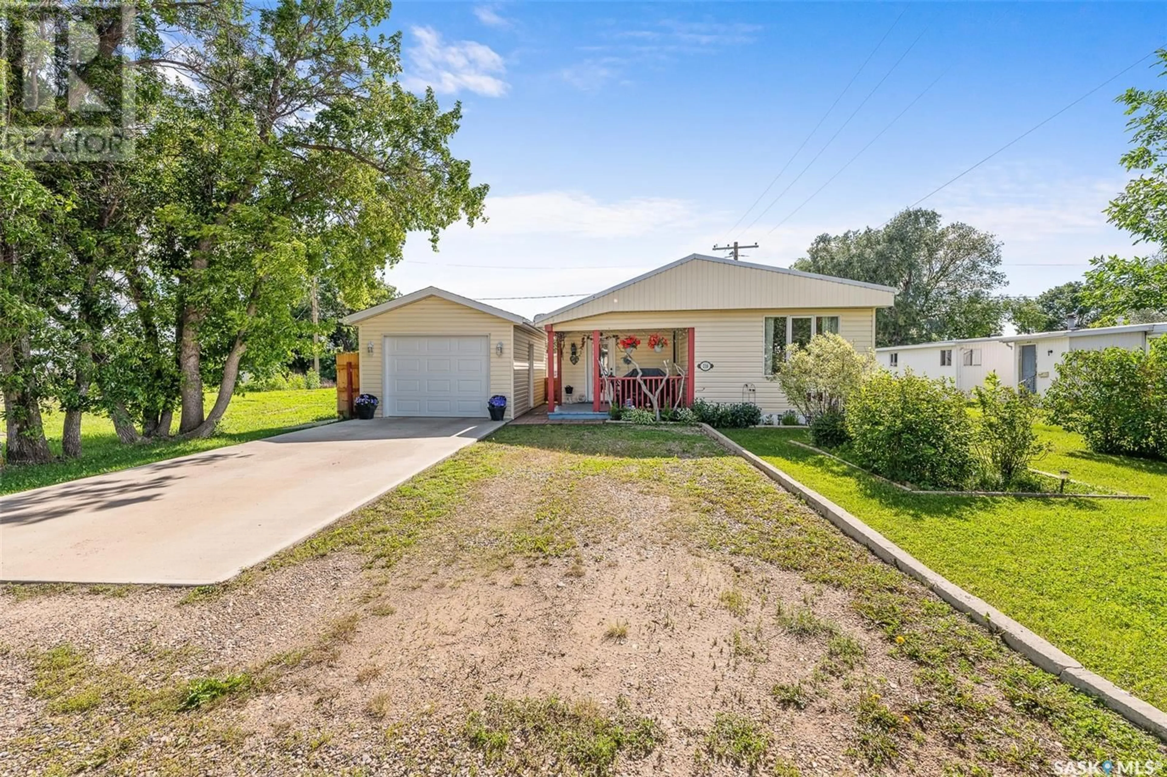 A pic from outside/outdoor area/front of a property/back of a property/a pic from drone, street for 116 LARCH STREET, Caronport Saskatchewan S0H0S0