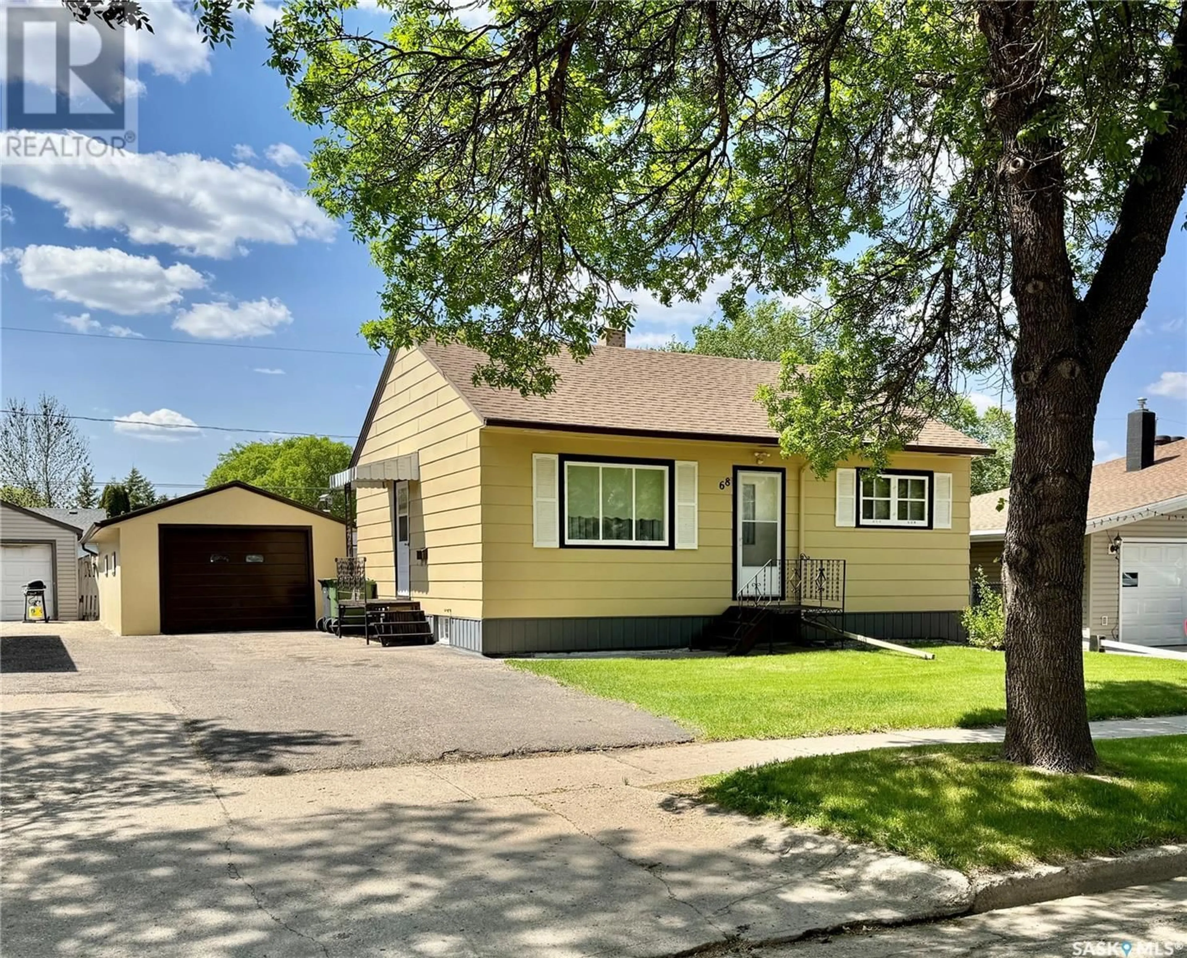 Home with vinyl exterior material, street for 68 REAMAN AVENUE, Yorkton Saskatchewan S3N2B9