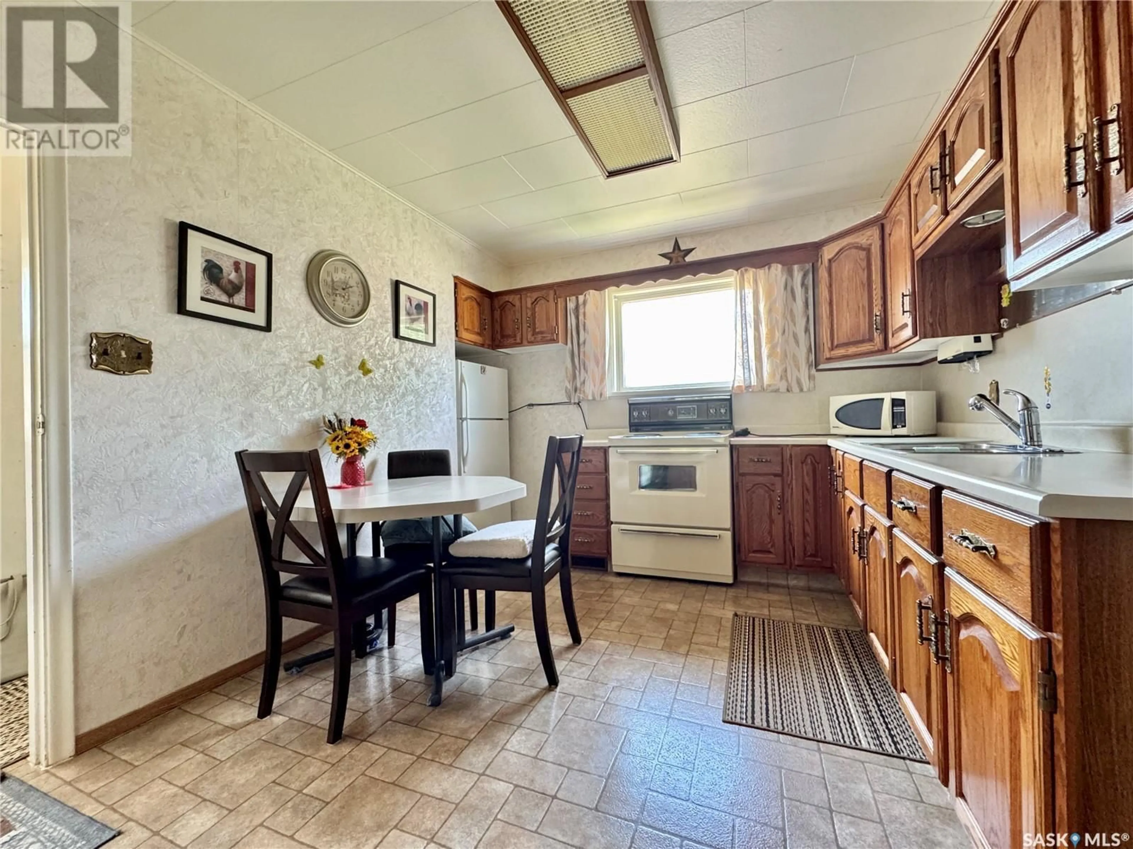 Standard kitchen, ceramic/tile floor for 68 REAMAN AVENUE, Yorkton Saskatchewan S3N2B9