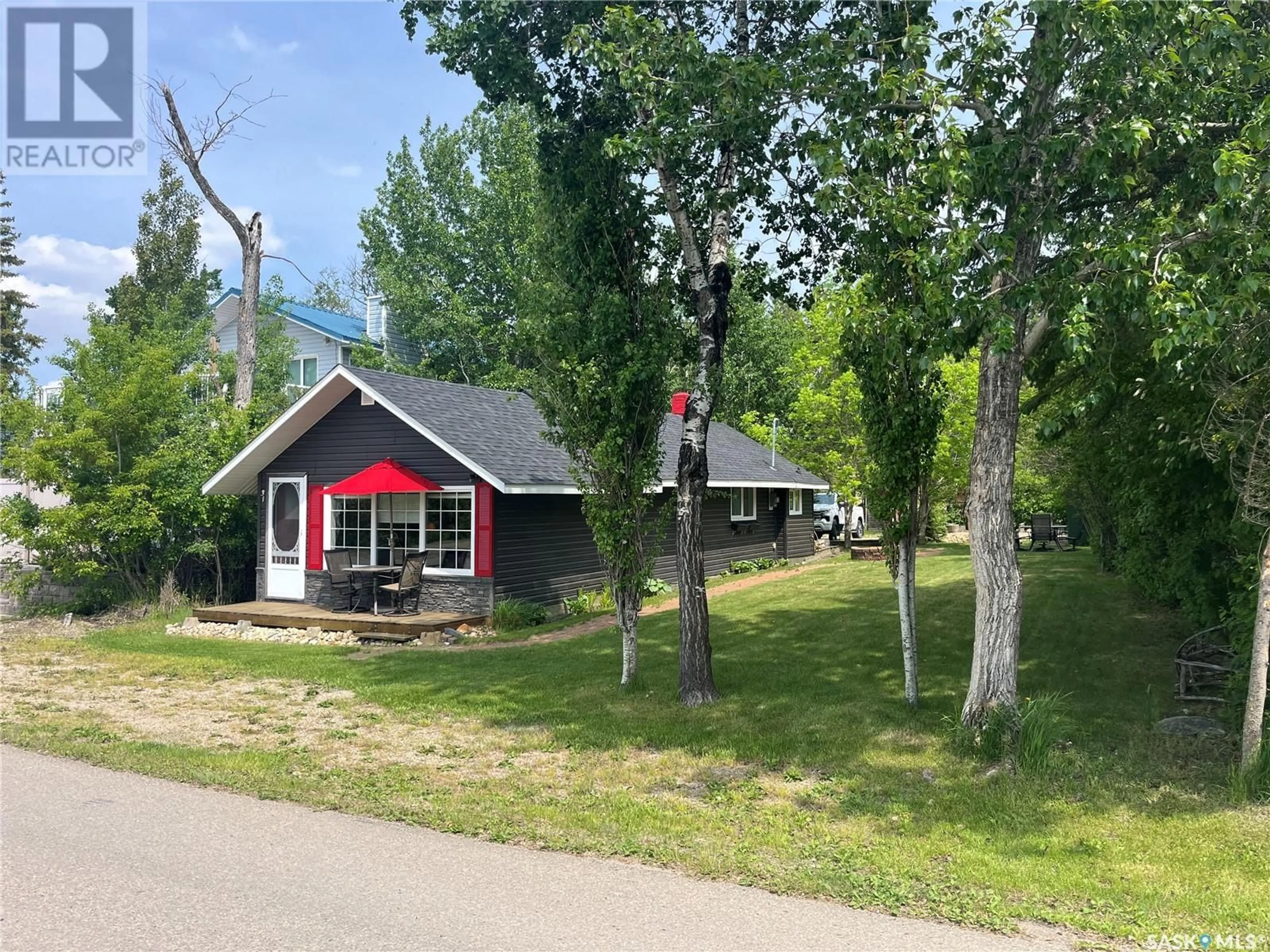 A pic from outside/outdoor area/front of a property/back of a property/a pic from drone, street for 31 SHORELINE DRIVE, Fishing Lake Saskatchewan S0A1Y0