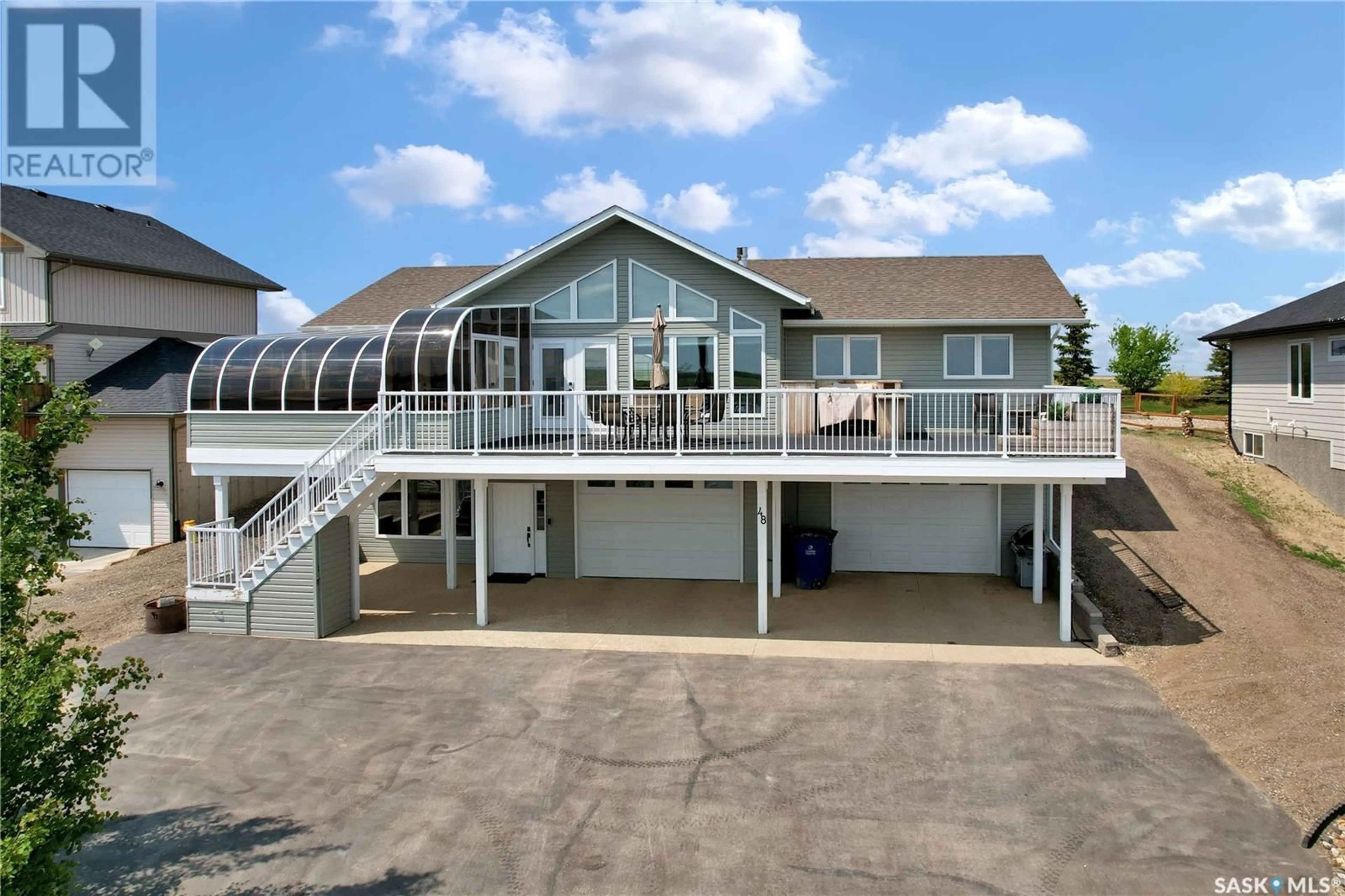 A pic from outside/outdoor area/front of a property/back of a property/a pic from drone, water/lake/river/ocean view for 48 MAWSON DRIVE, Shields Saskatchewan S7C0A2